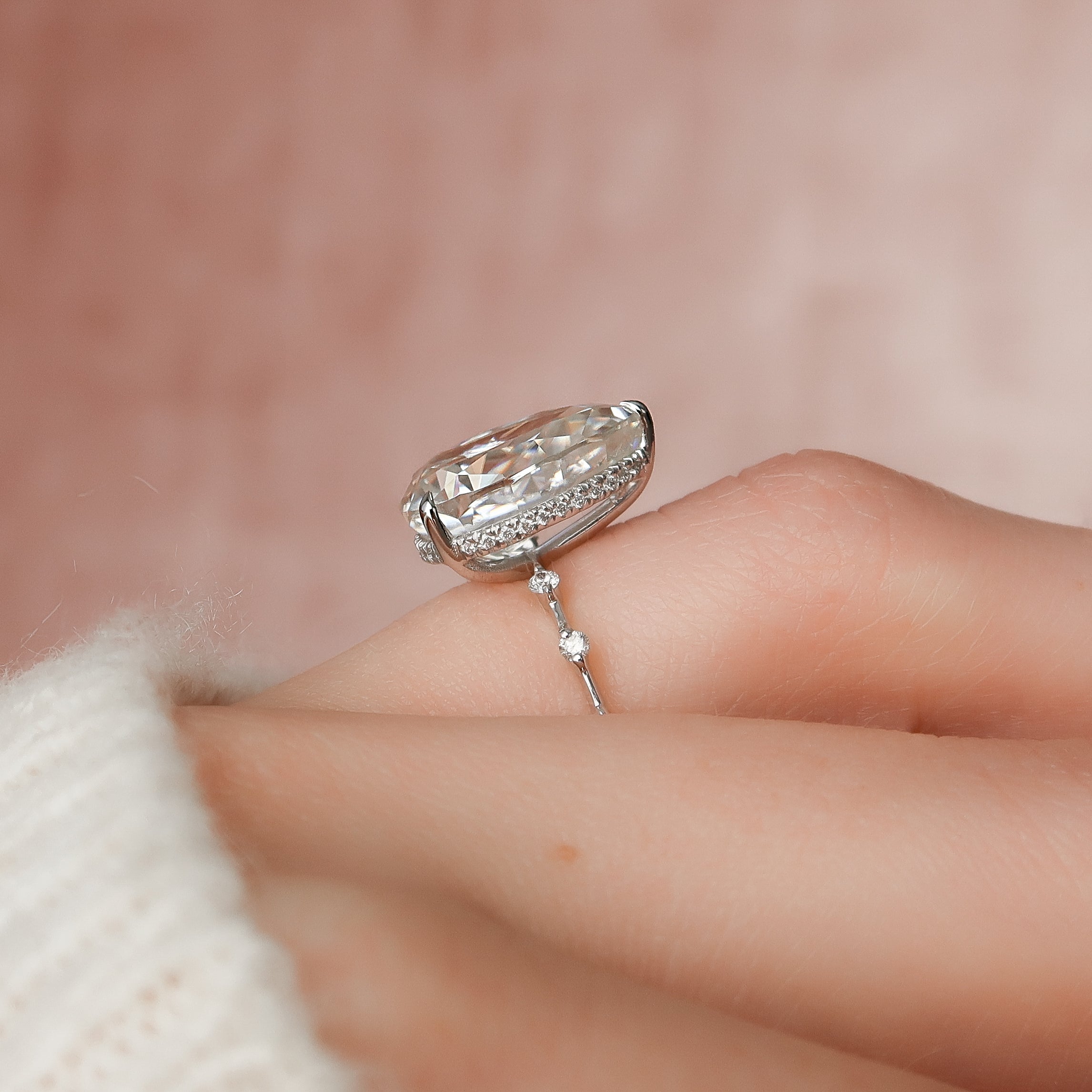 Pear cut CVD diamond engagement ring with hidden halo and dainty pave band in white gold