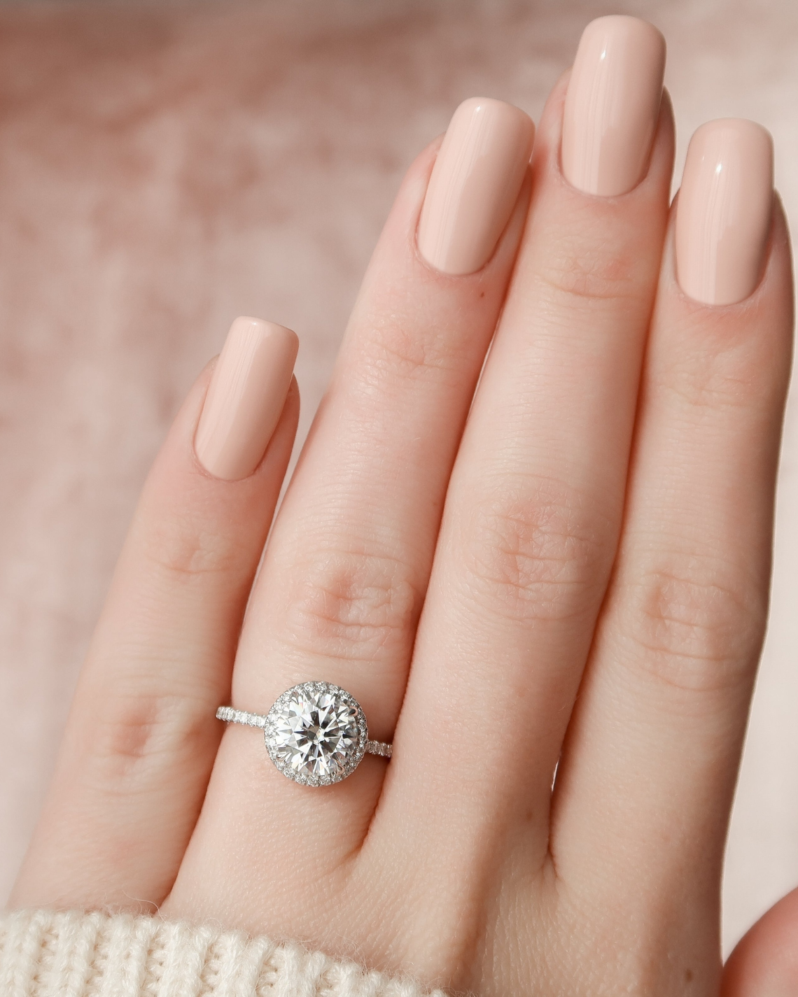 Round cut CVD diamond engagement ring with halo and pave diamond band in platinum setting