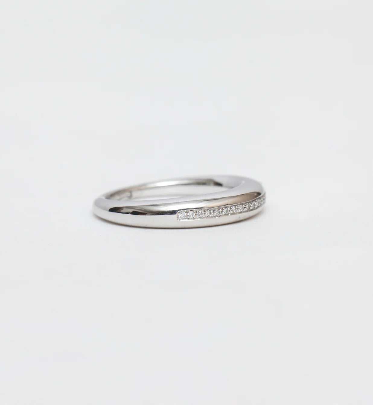 0.11 TCW Round CVD Diamond Channel Setting Wedding Band