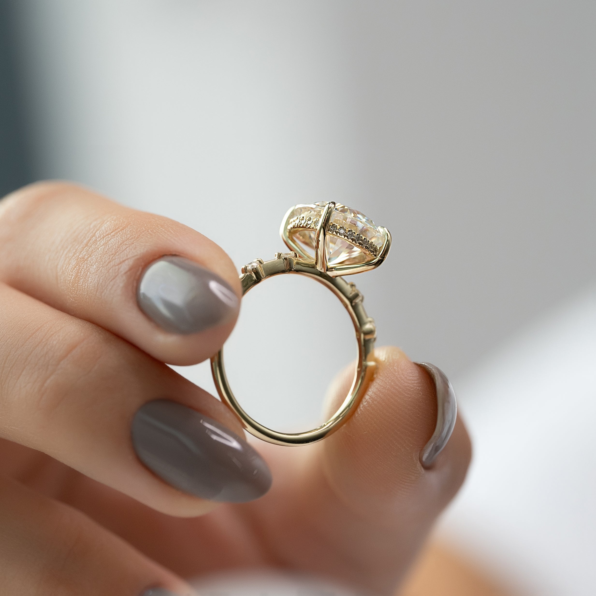 Round cut CVD diamond engagement ring with hidden halo and pave band in white gold