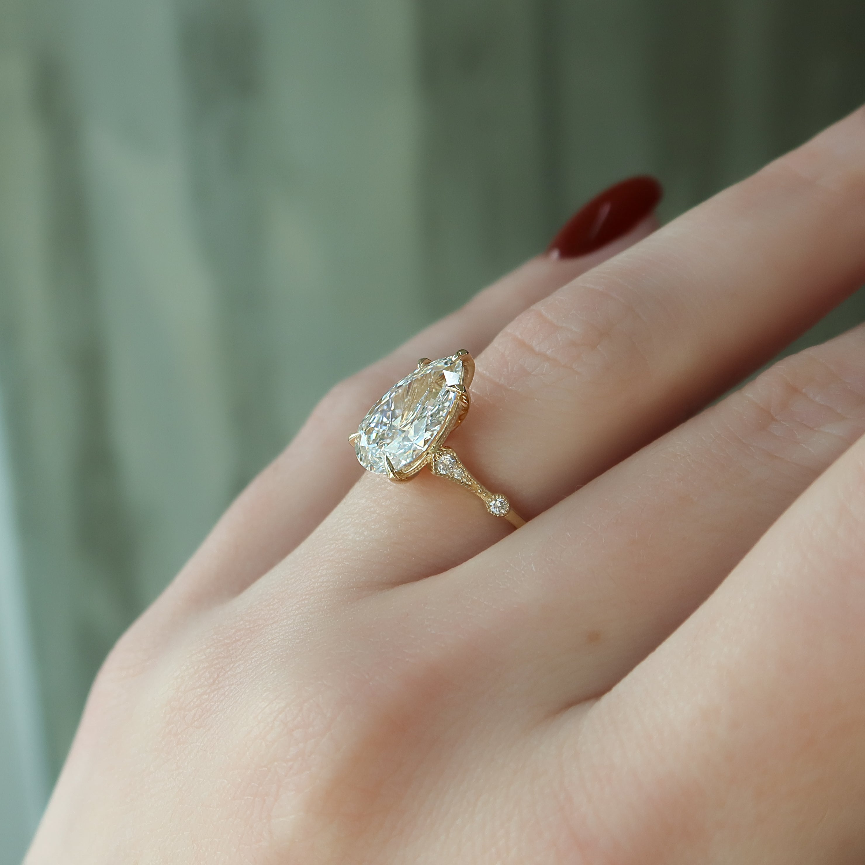 Pear cut CVD diamond vintage style engagement ring with intricate detailing