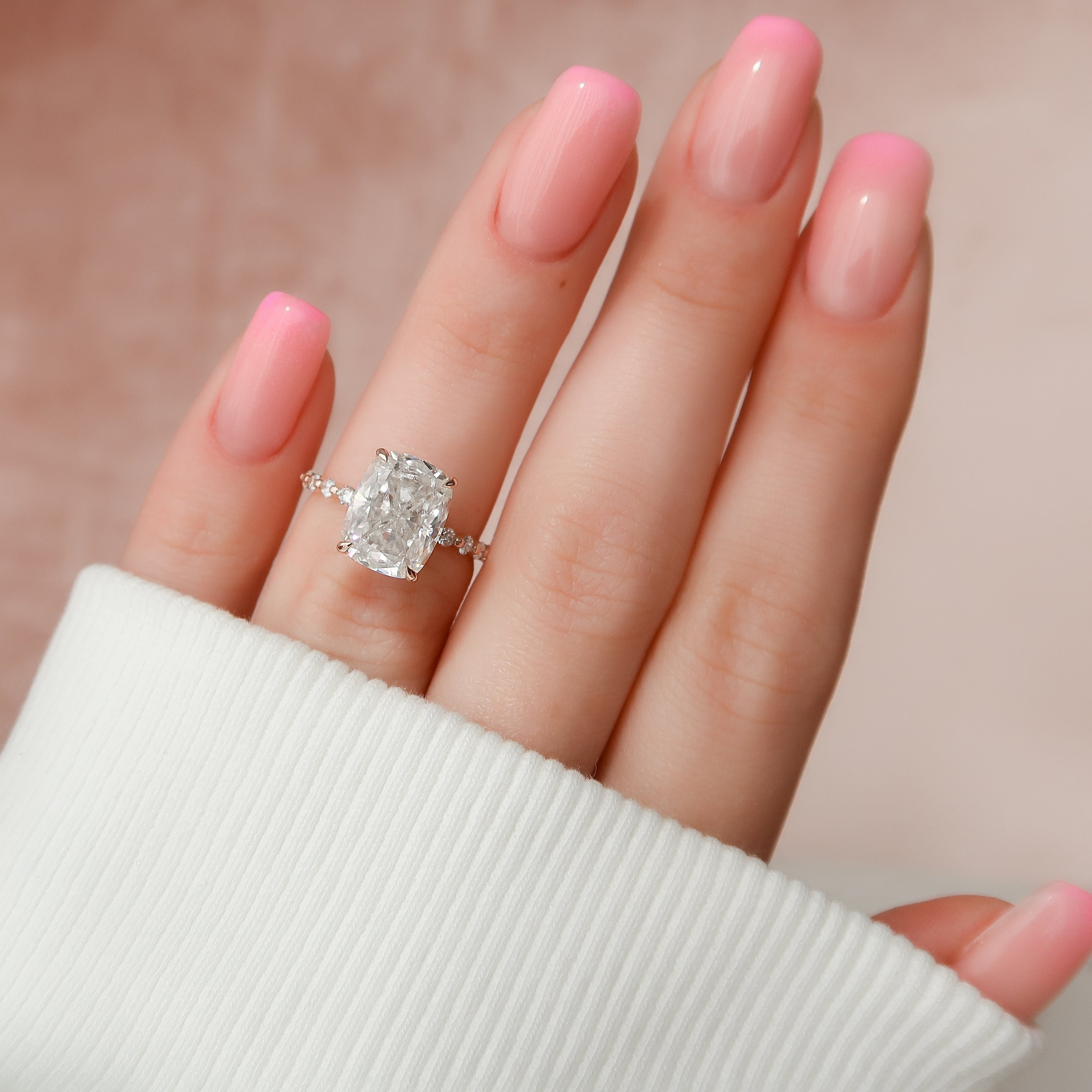 Elongated cushion cut CVD diamond ring with hidden halo and pave style band in platinum