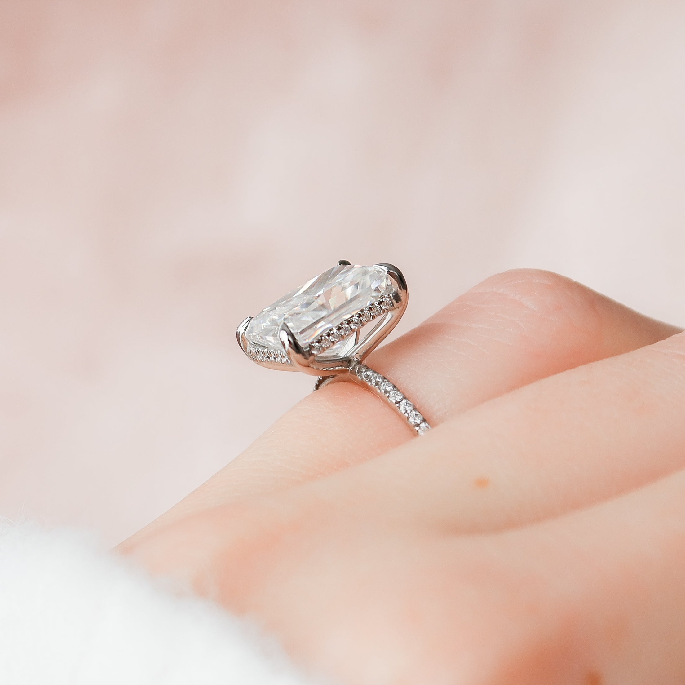 Radiant cut CVD diamond engagement ring with hidden halo and pave diamond band in white gold