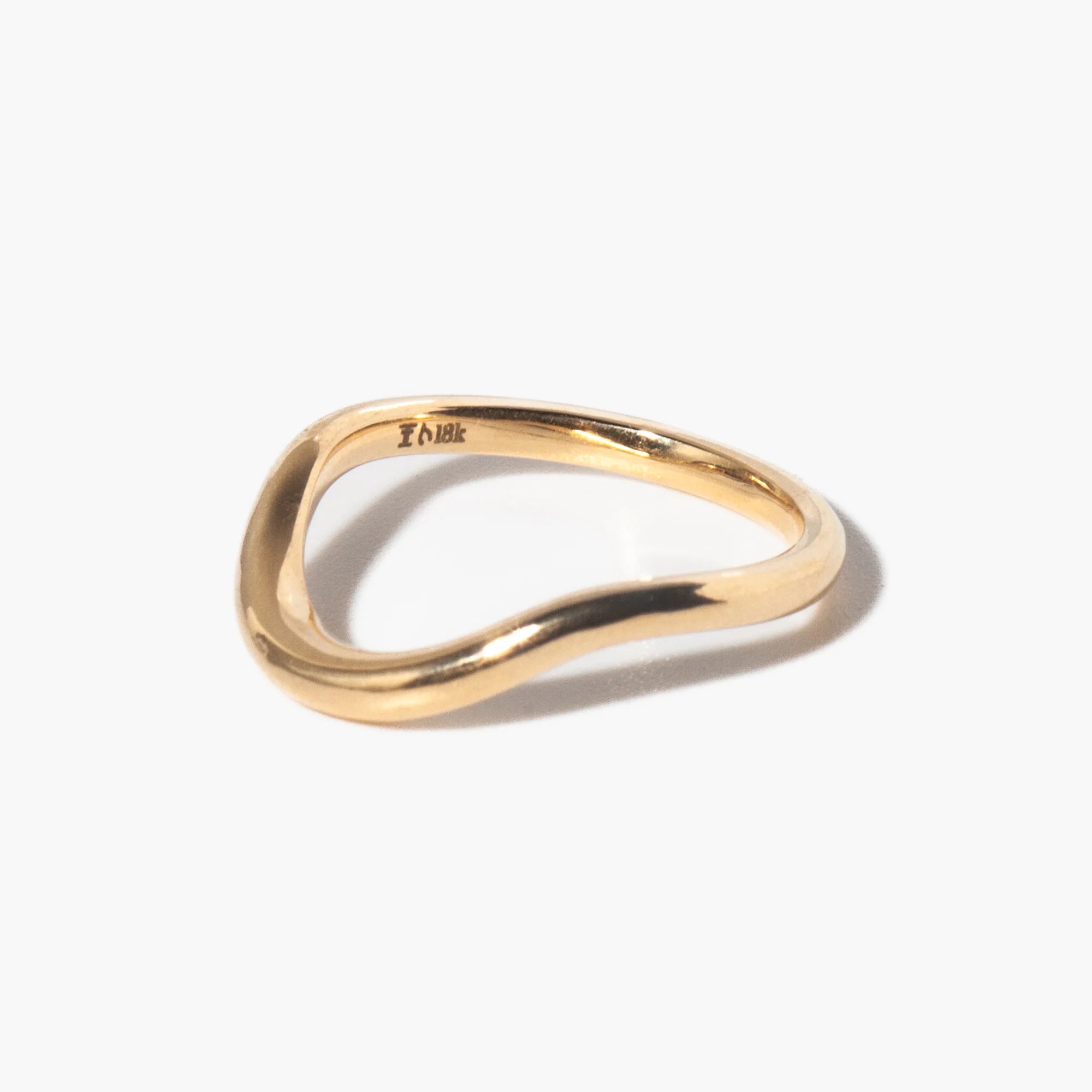Plain curved wedding band