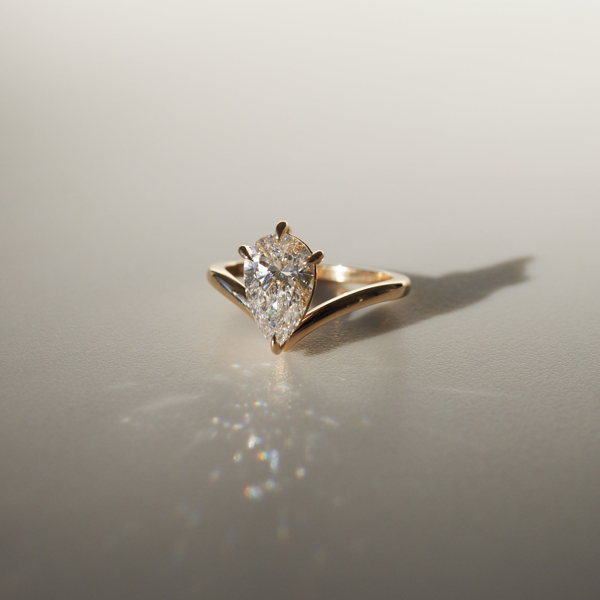 Pear shaped moissanite solitaire engagement ring in white gold setting, 1.50-2.50 carats