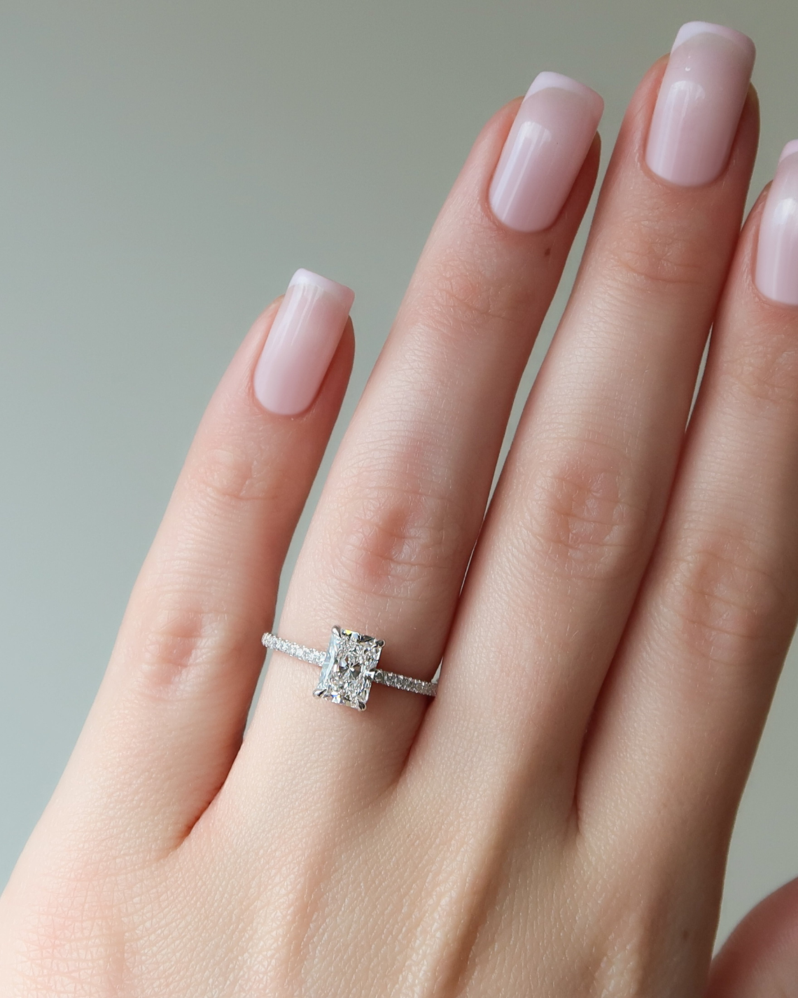 Radiant cut CVD diamond engagement ring with pave diamond band in platinum setting