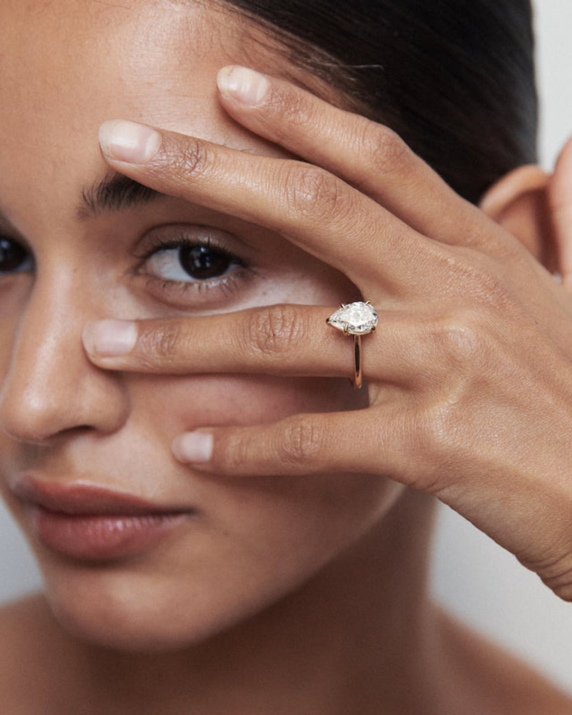 1.0–2.0 CT pear cut lab grown diamond solitaire engagement ring in gold, teardrop shape with minimalist and timeless setting