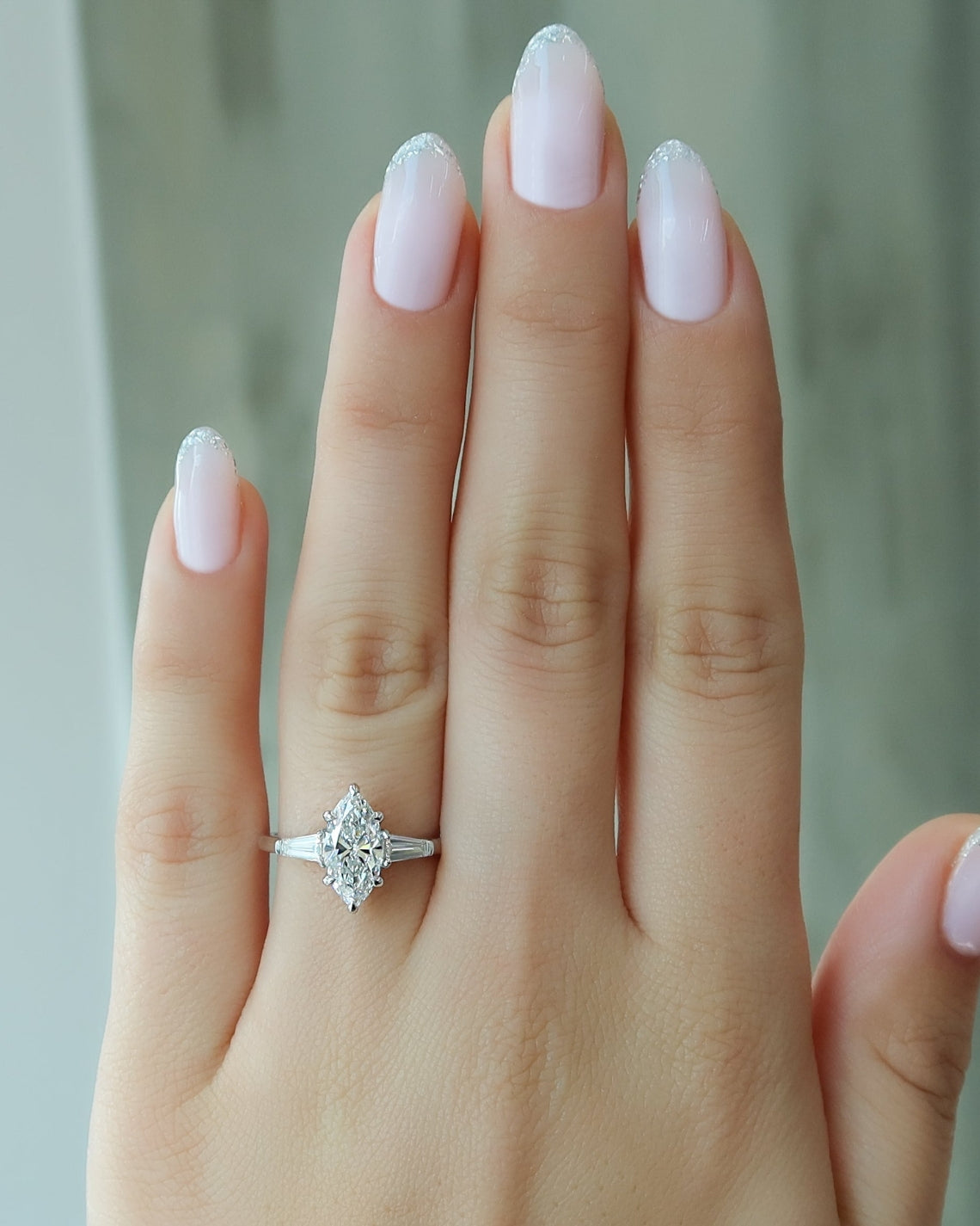 Marquise cut CVD diamond three stone engagement ring in white gold setting