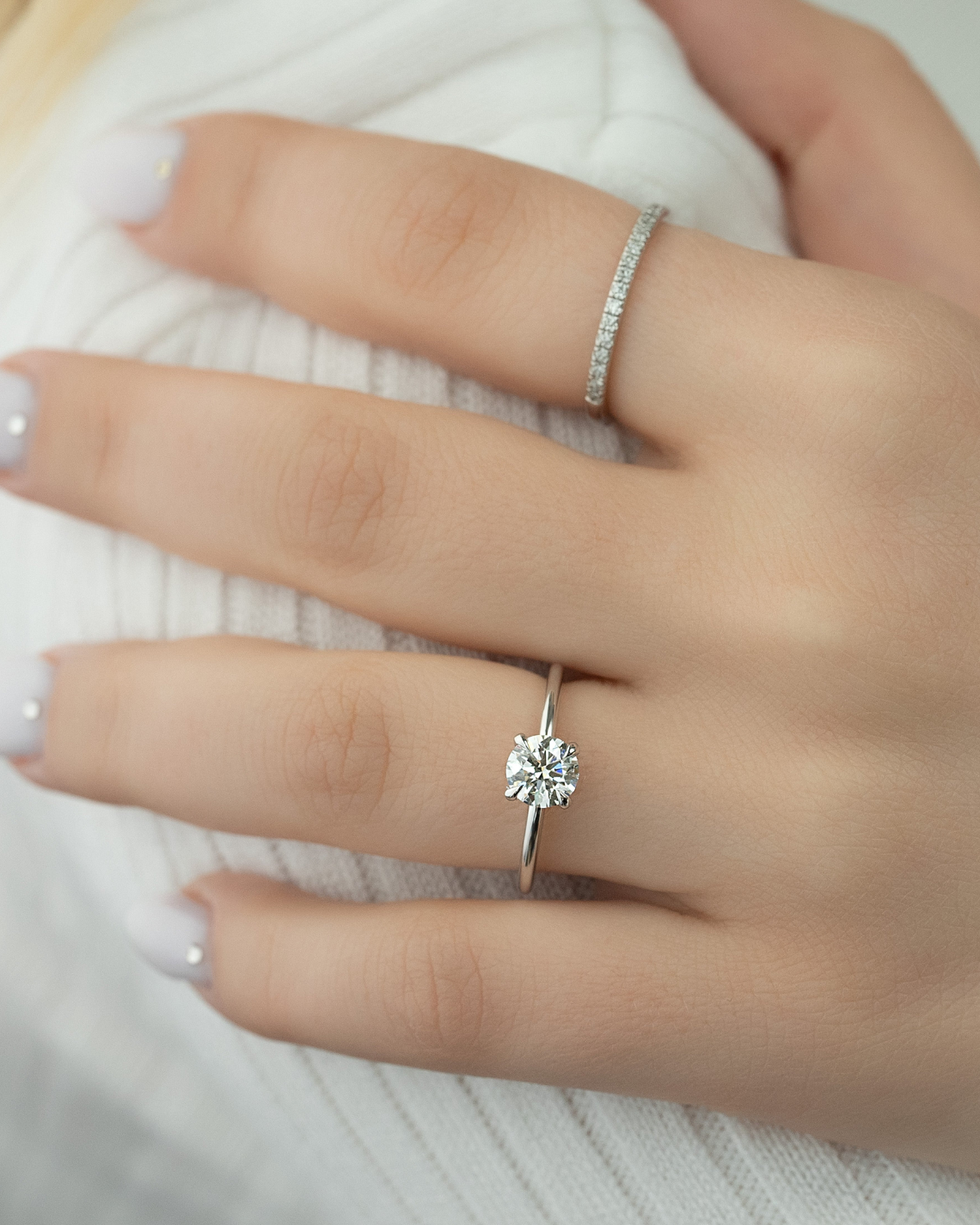 Round cut CVD diamond hidden halo engagement ring in white gold setting