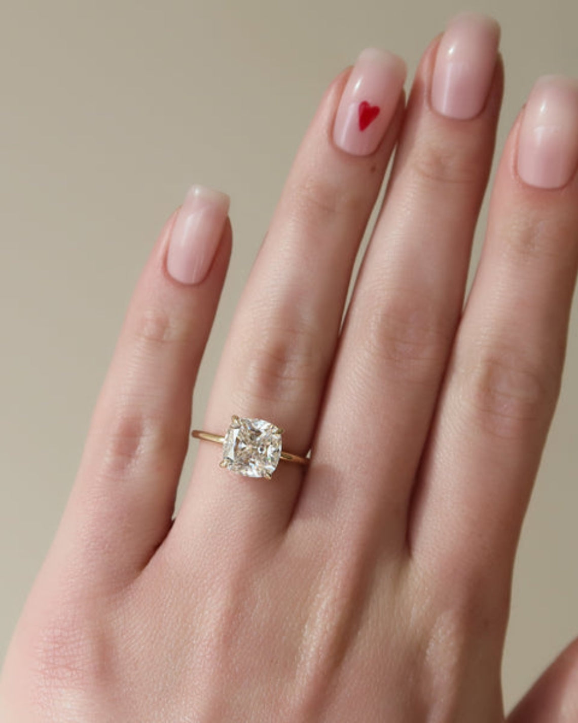 Cushion cut CVD diamond hidden halo engagement ring in platinum setting