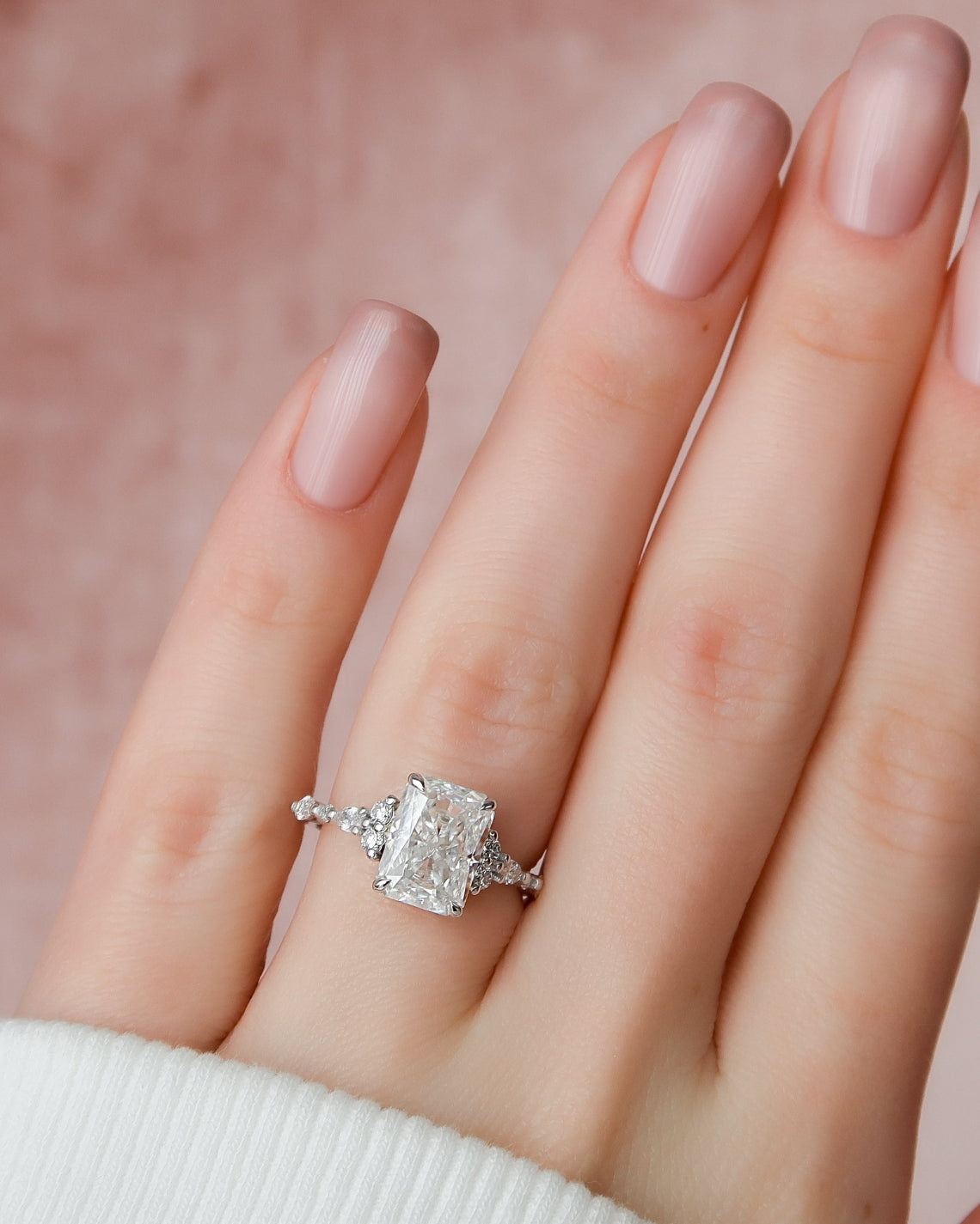 Radiant cut CVD diamond cluster engagement ring with timeless sparkle