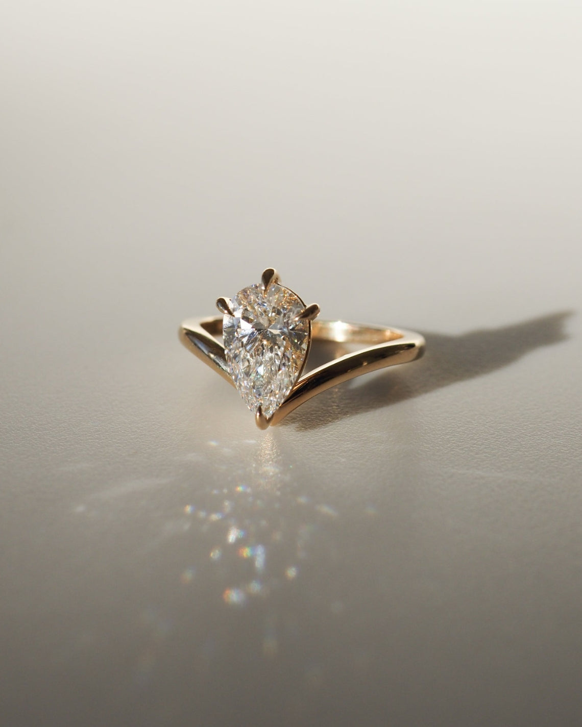 Pear shaped moissanite solitaire engagement ring in white gold setting, 1.50-2.50 carats