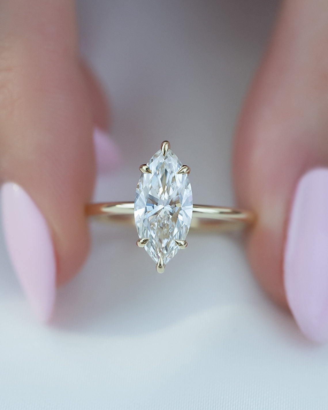 Marquise cut moissanite engagement ring with hidden halo in platinum setting, 2.0-4.0 CT