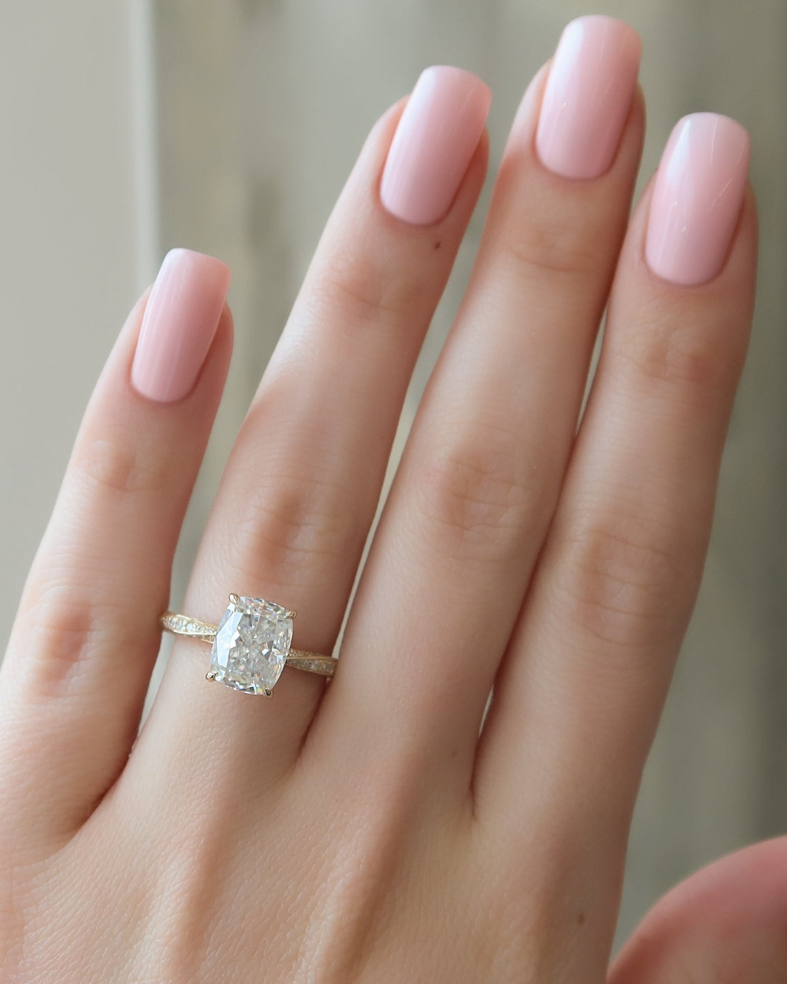 Elongated cushion cut CVD diamond twisted pave engagement ring in white gold