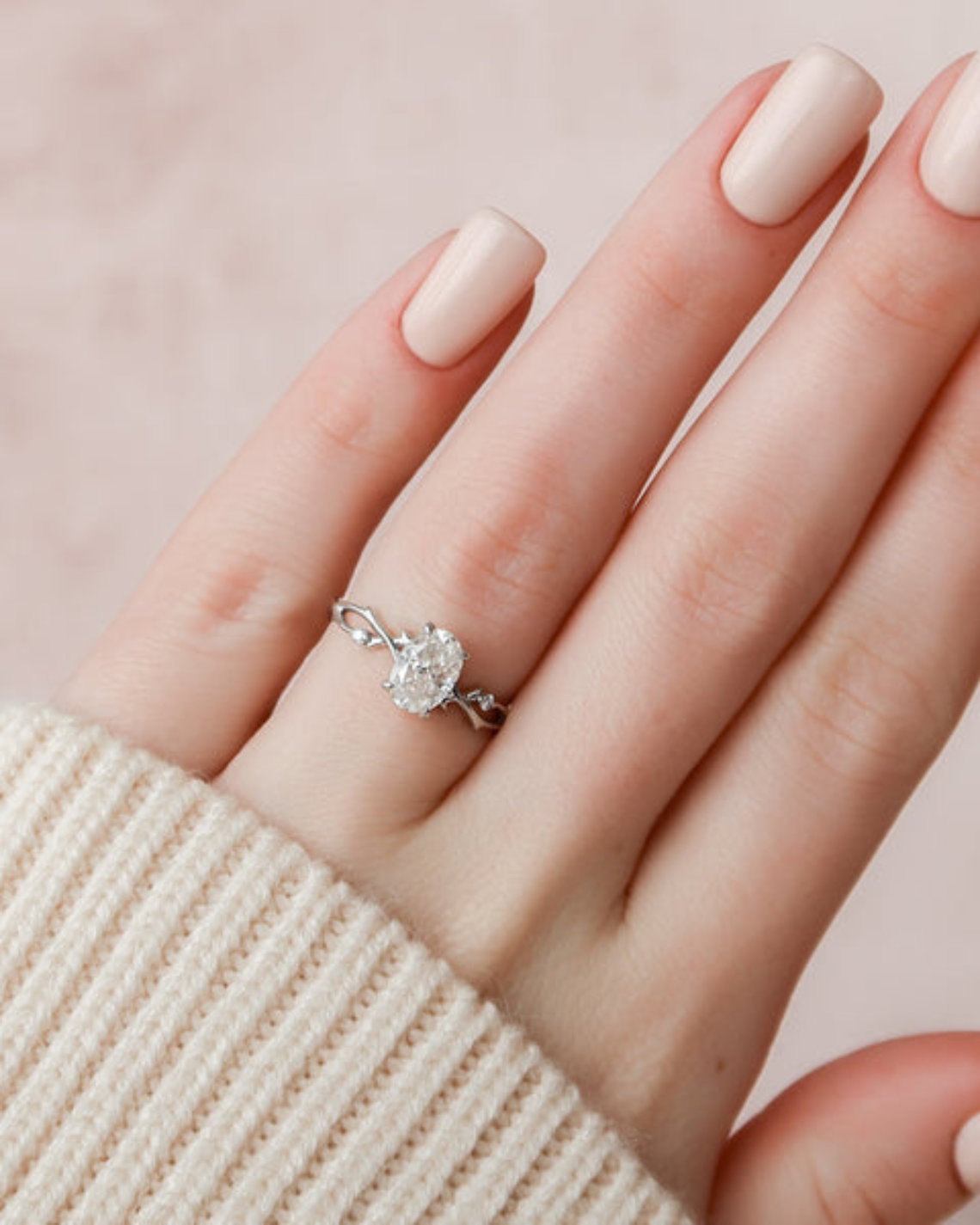 Oval cut CVD diamond engagement ring with twig-style band in white gold