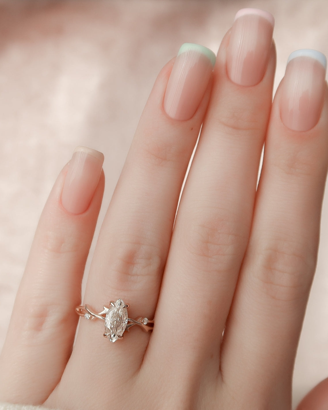 Marquise cut CVD diamond engagement ring with twig-style band in white gold