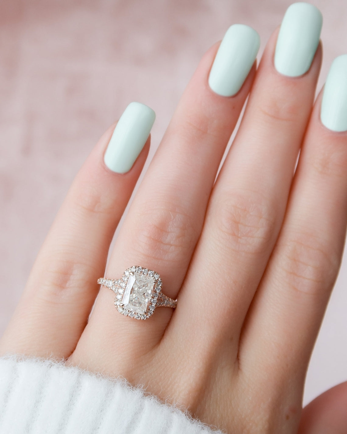 Radiant cut CVD diamond engagement ring with halo and split shank band, elegant bridal jewelry design