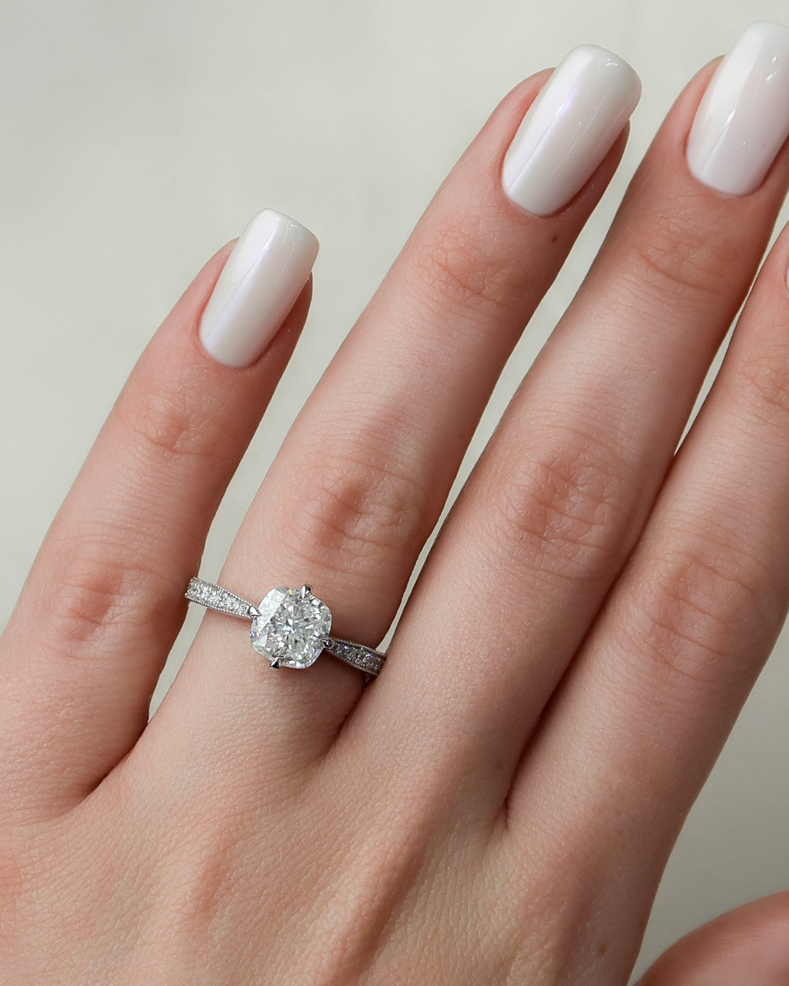 Cushion cut CVD diamond pave engagement ring with diamond-accented band in white gold