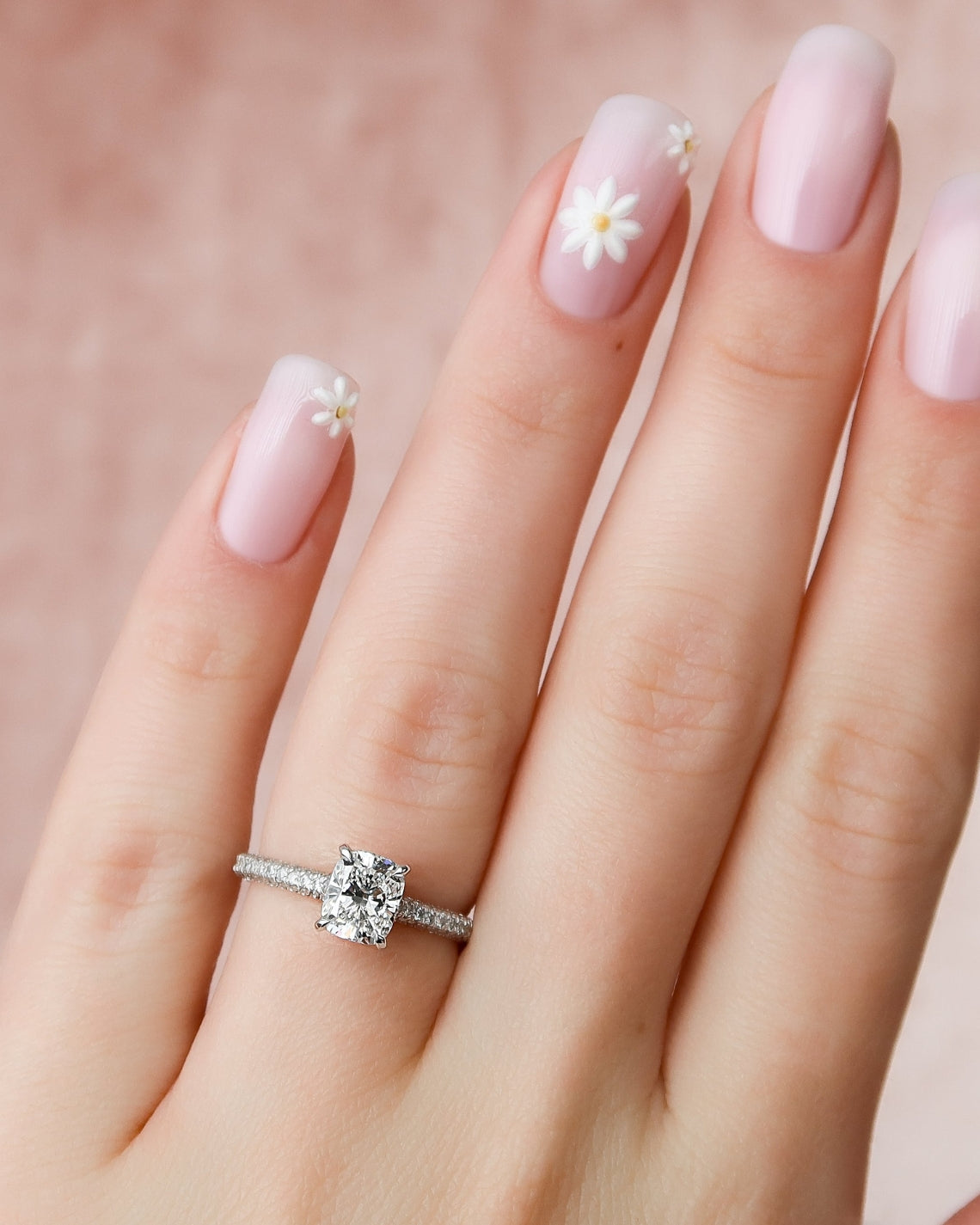 Elongated cushion cut CVD diamond engagement ring with hidden halo and pave diamond band in white gold