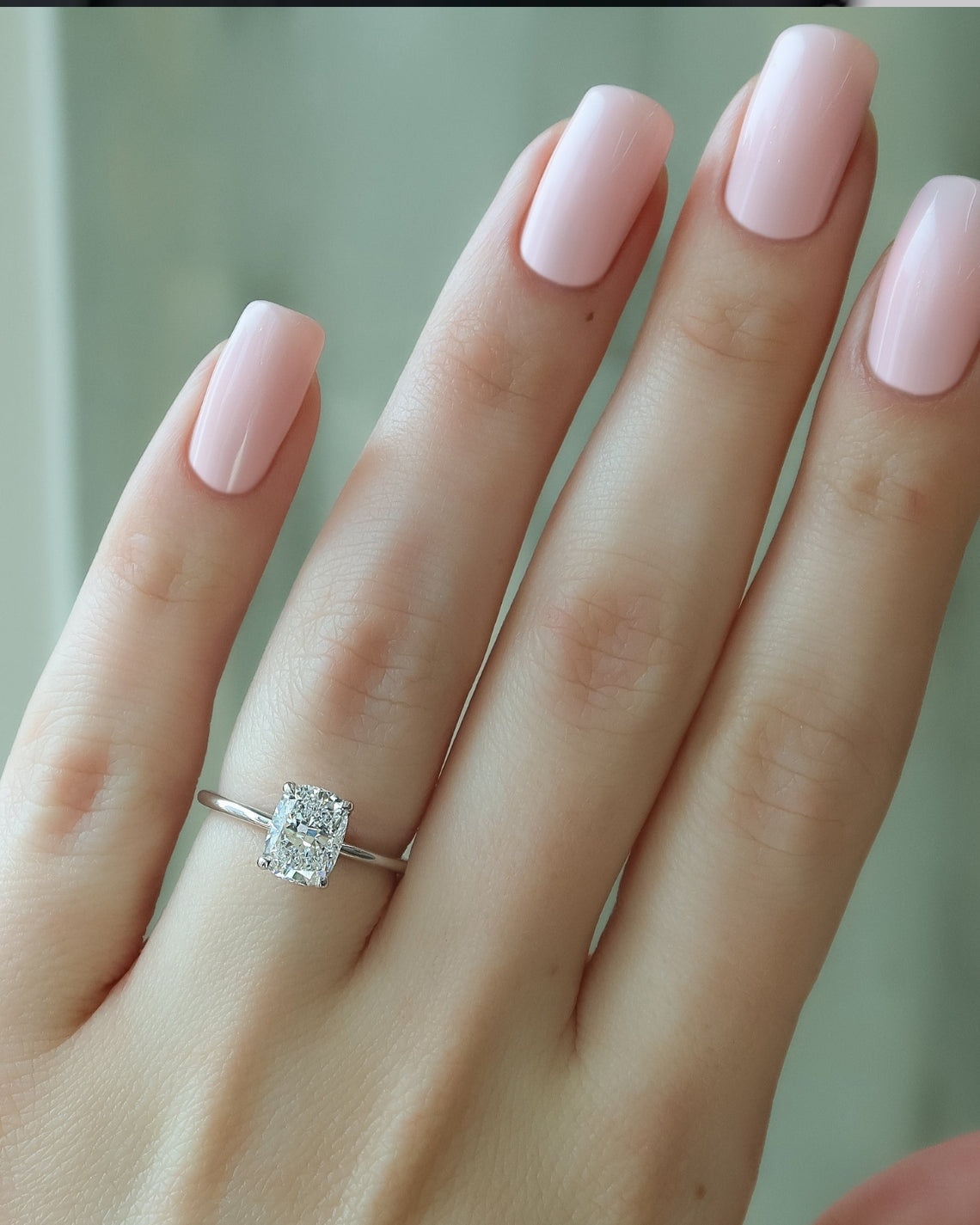 Elongated cushion cut CVD diamond solitaire engagement ring in white gold setting