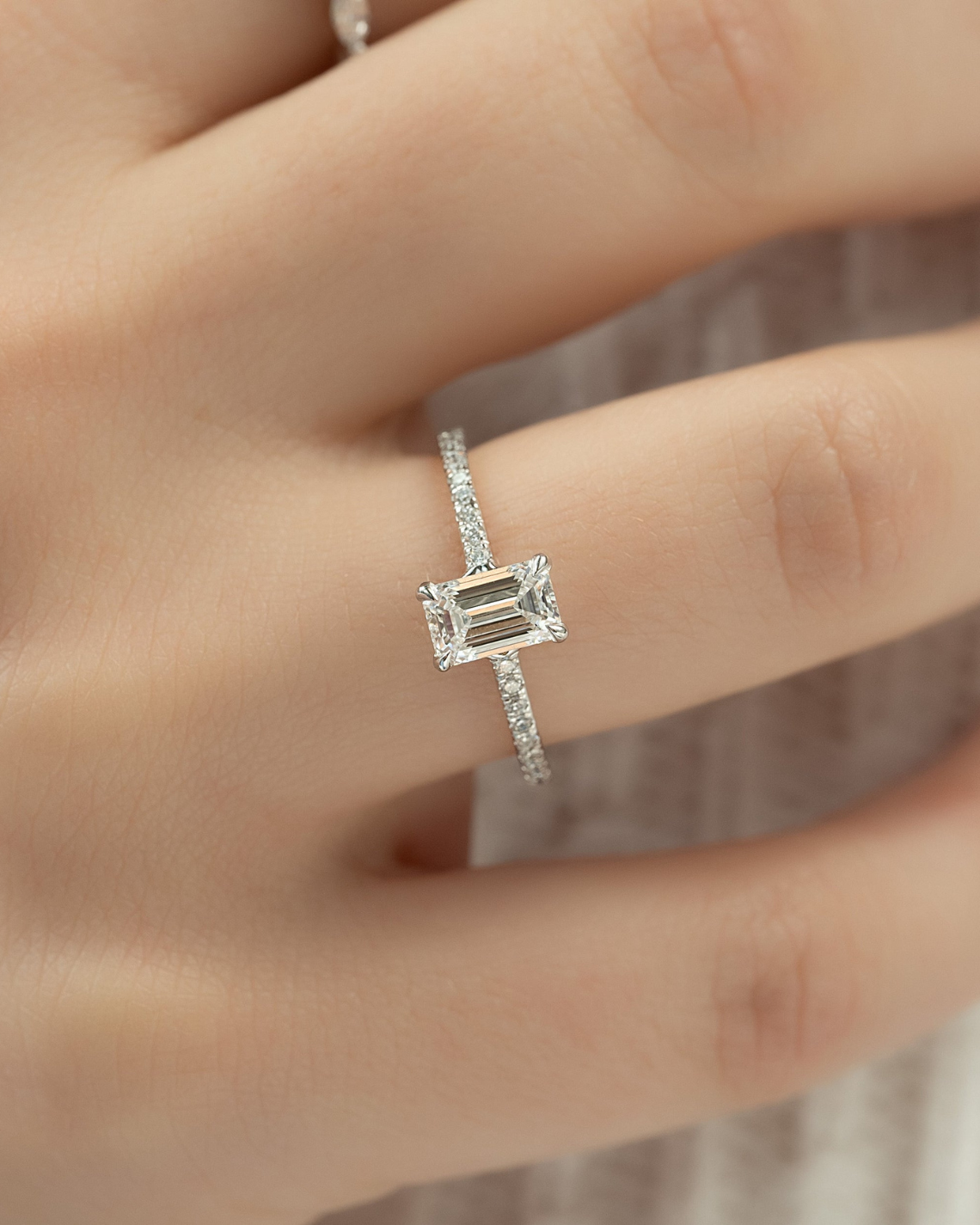 Emerald cut CVD diamond pave setting engagement ring in white gold