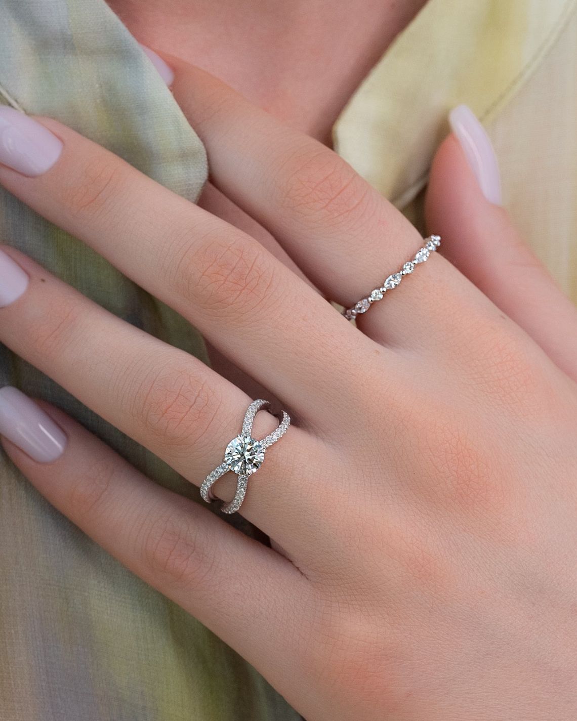 Round cut CVD diamond criss-cross engagement ring in white gold setting