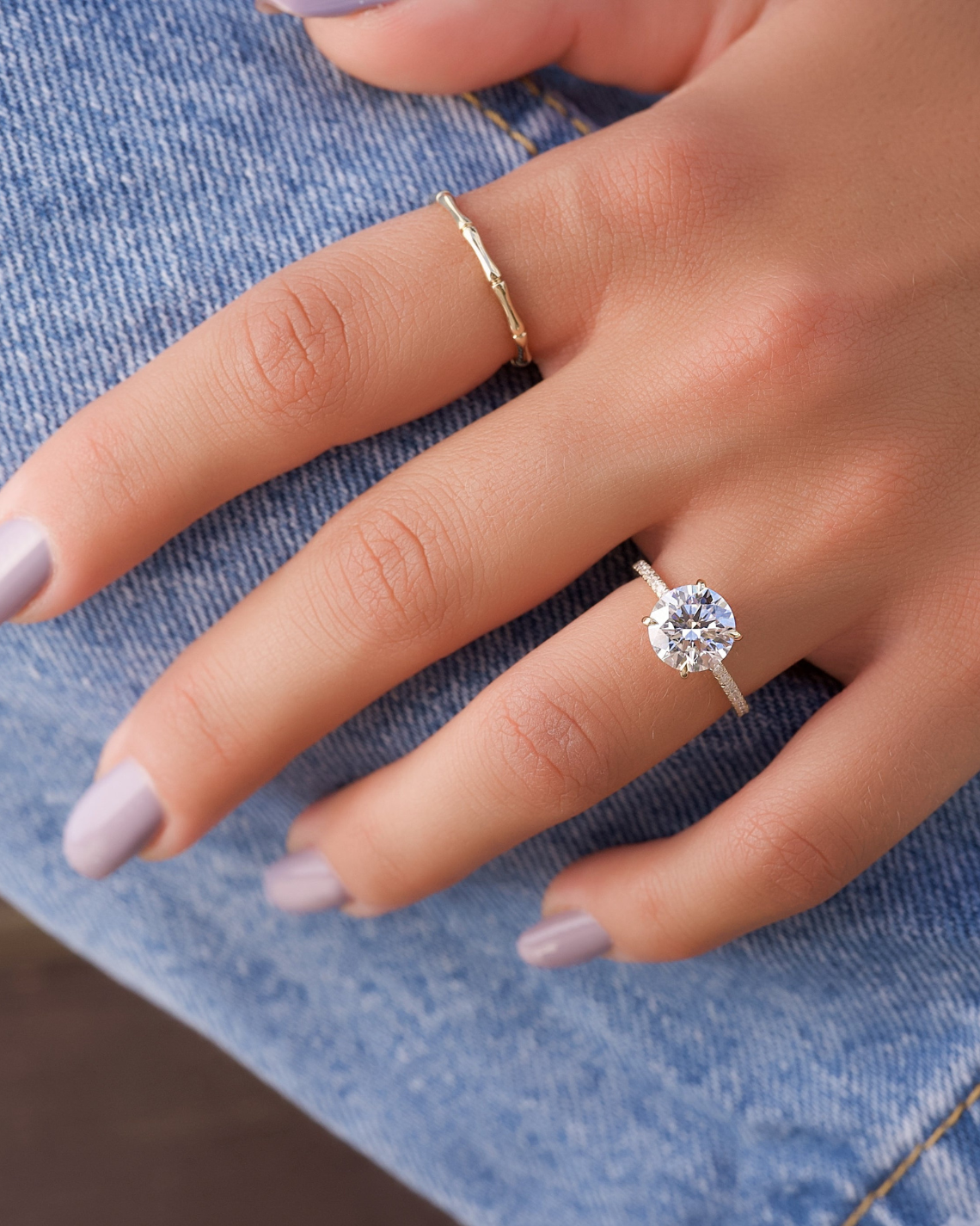 Round cut CVD diamond hidden halo engagement ring with pave band in white gold setting