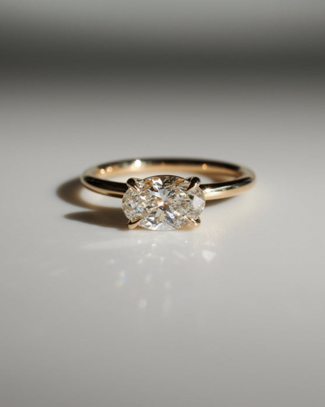 East-west elongated oval moissanite solitaire engagement ring in platinum setting, 1.0-3.0 carats