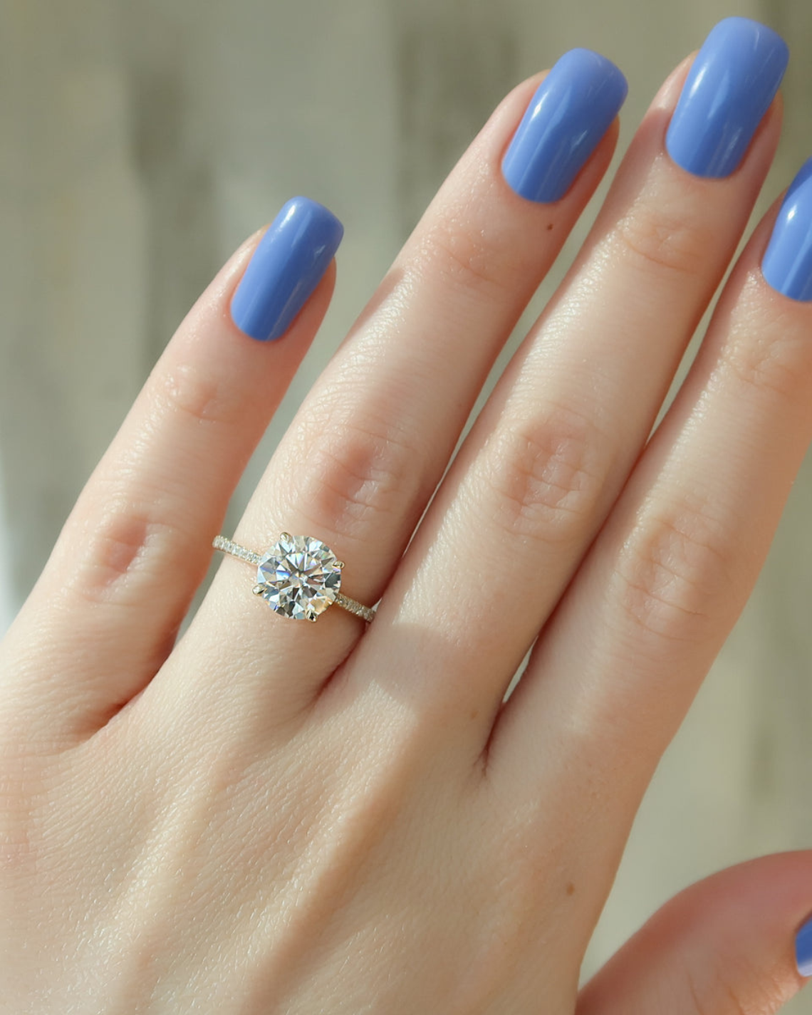 Round cut CVD diamond engagement ring with pave diamond band in white gold