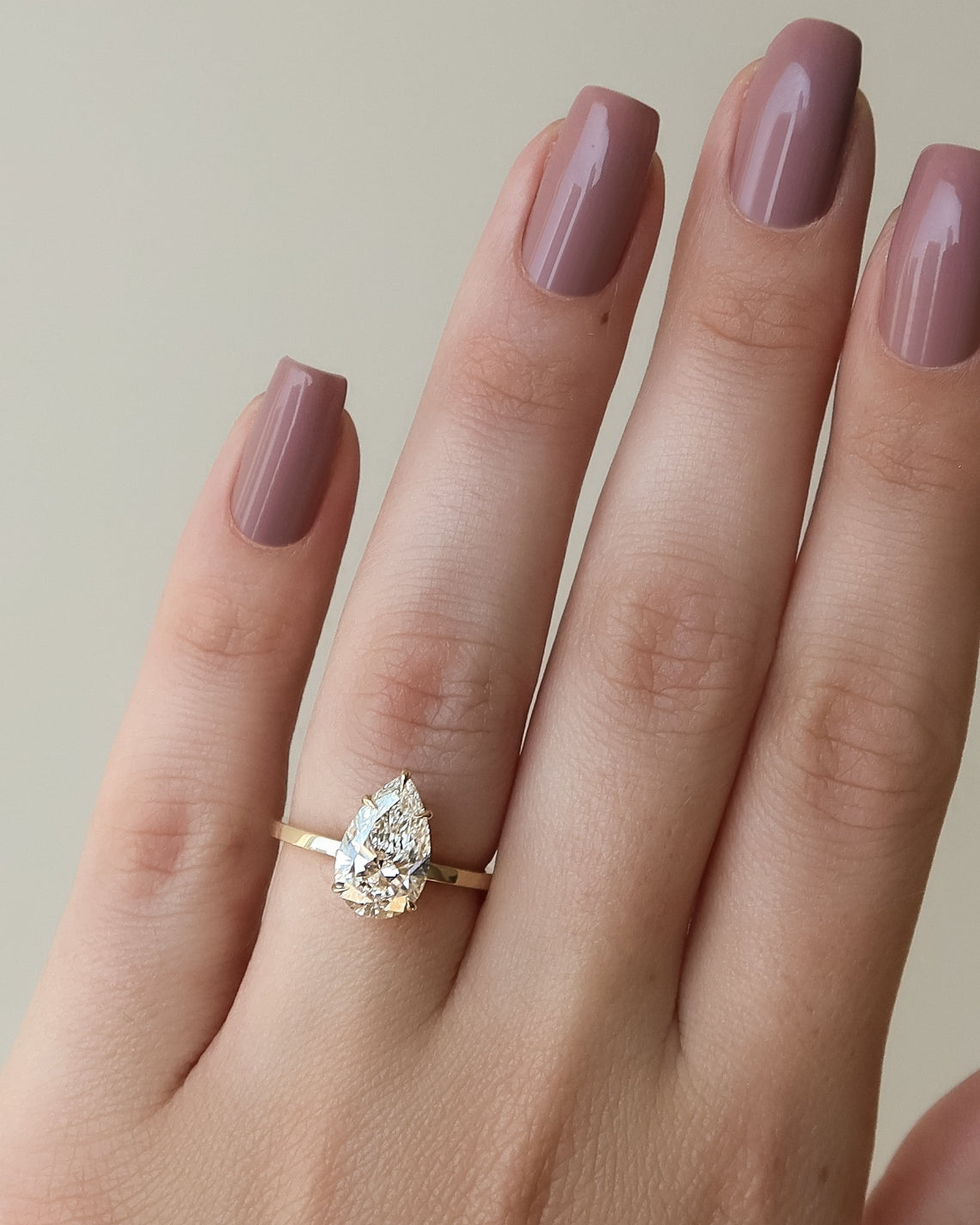 Pear cut CVD diamond solitaire engagement ring with classic band in white gold