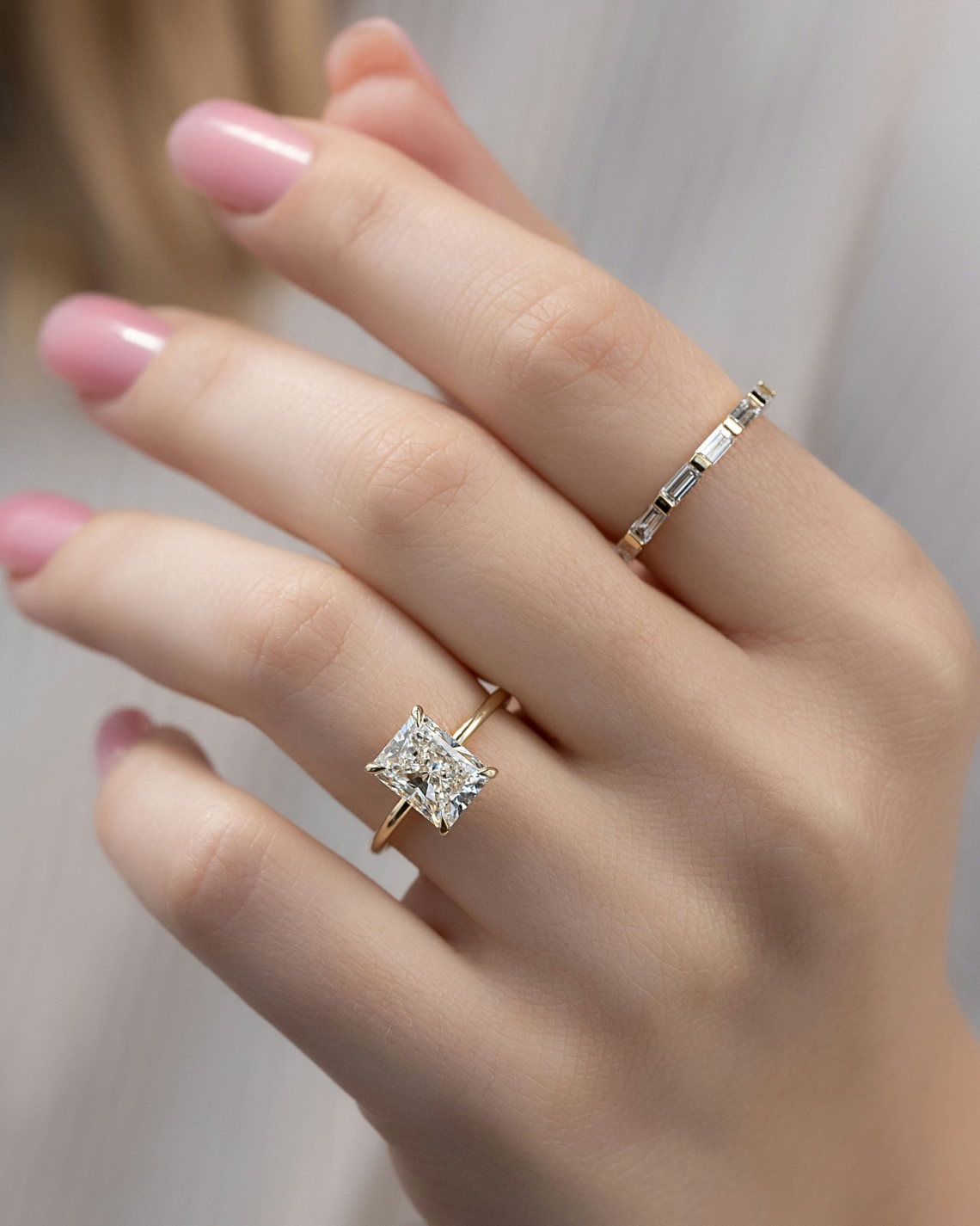 Radiant cut moissanite hidden halo engagement ring in white gold setting