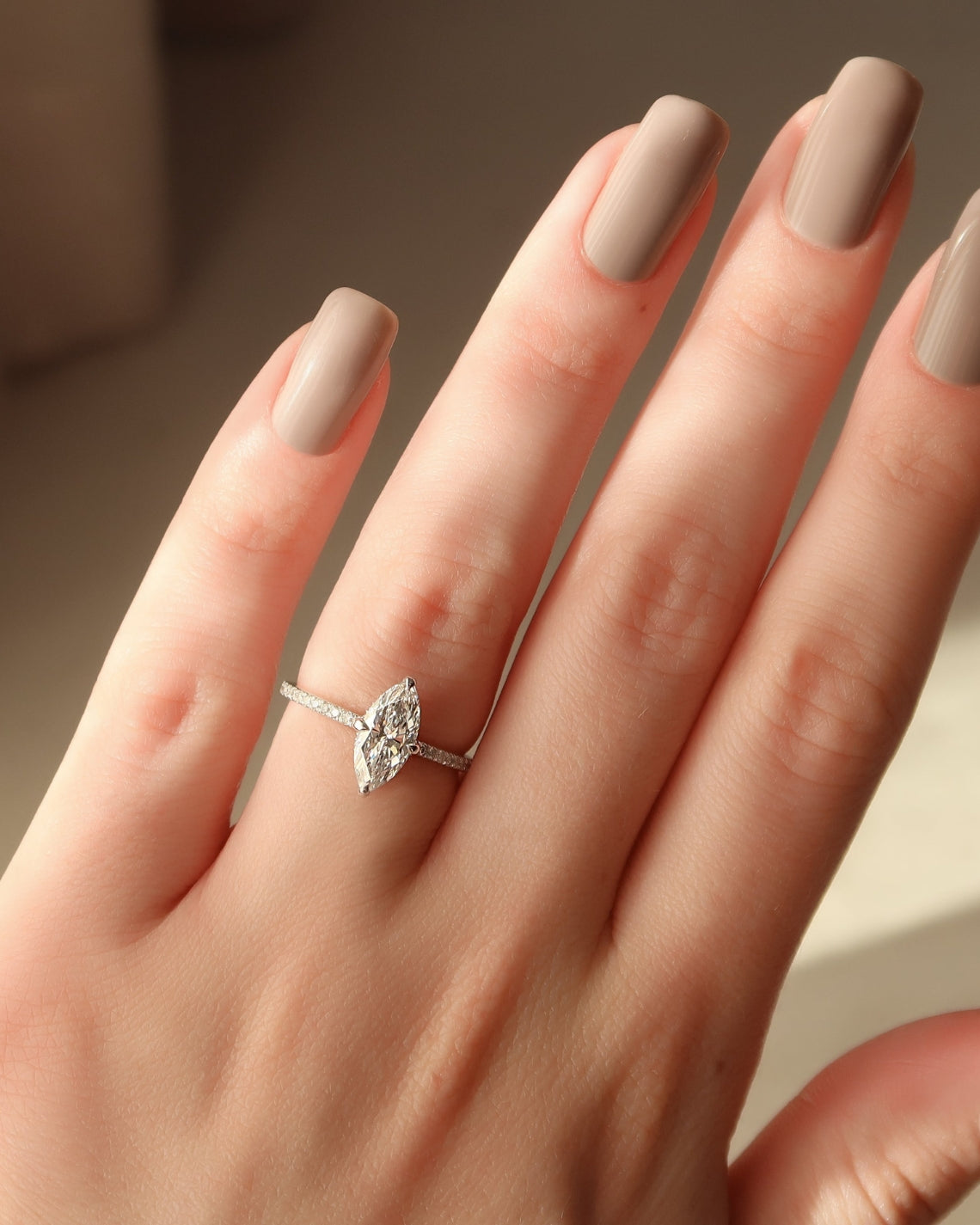 Marquise cut CVD diamond hidden halo engagement ring with pave band in white gold