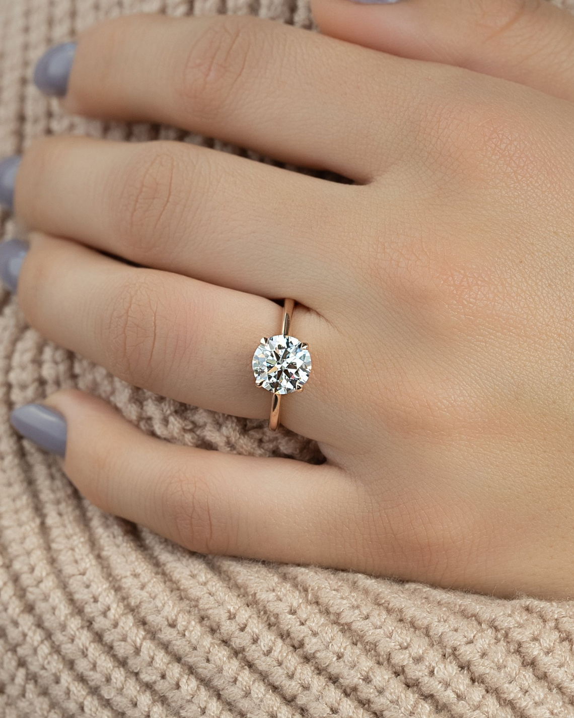 Round cut CVD diamond solitaire engagement ring in white gold setting