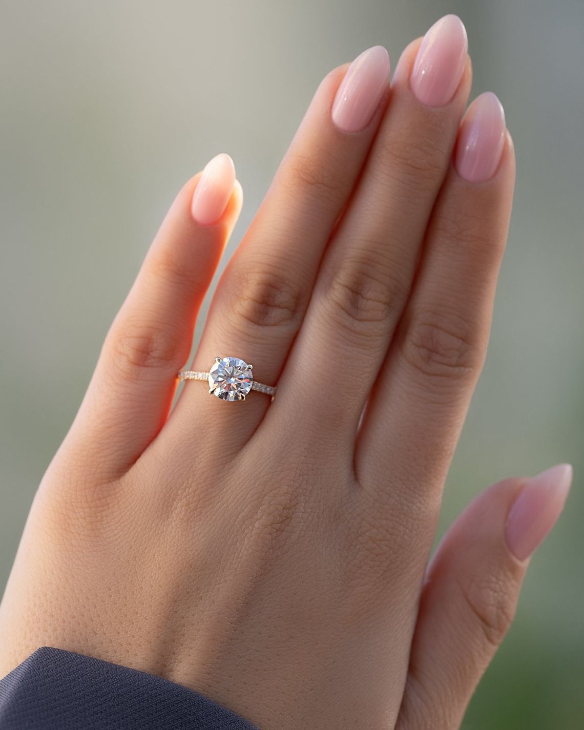 Round cut CVD diamond hidden halo engagement ring with pave diamond band in platinum setting