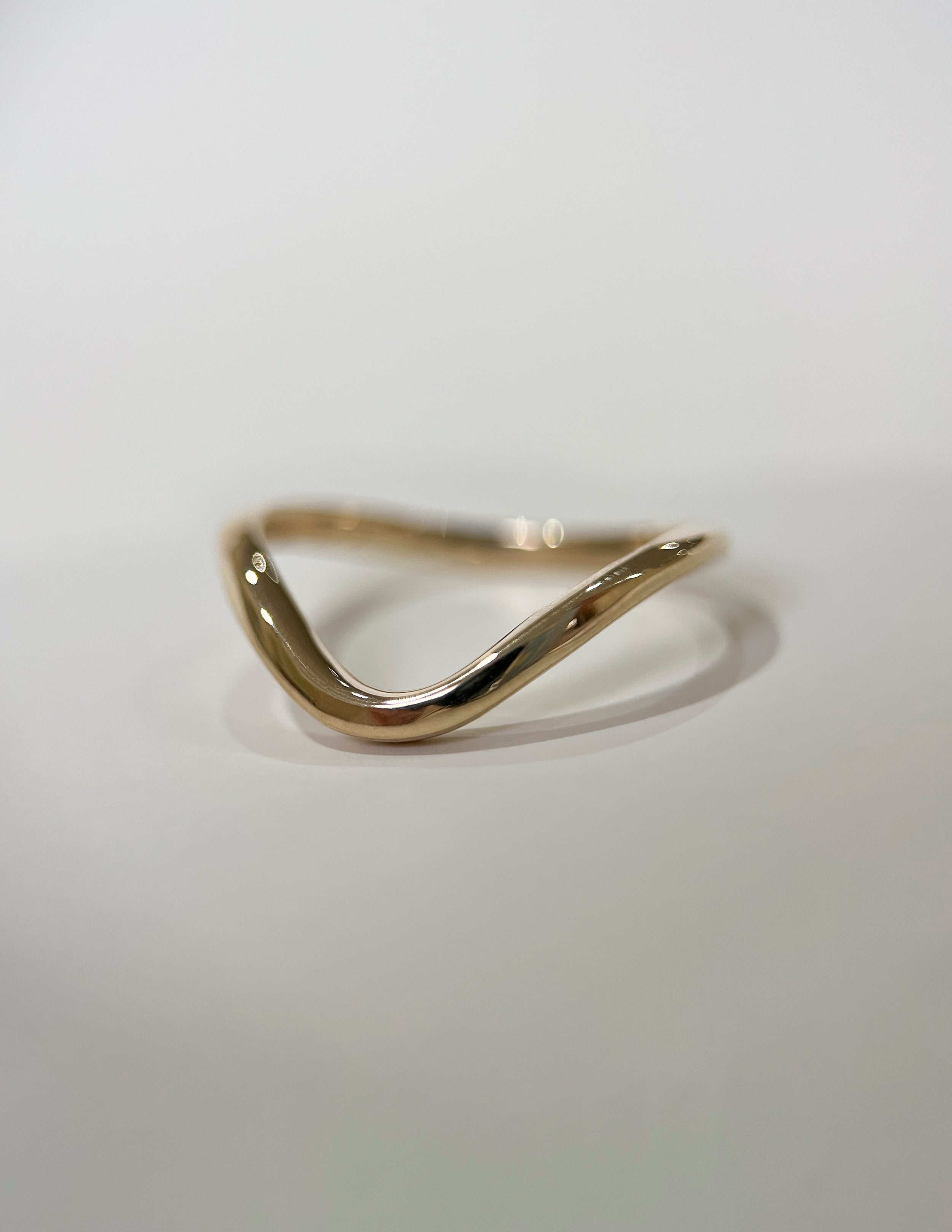 Plain curved Wedding Band