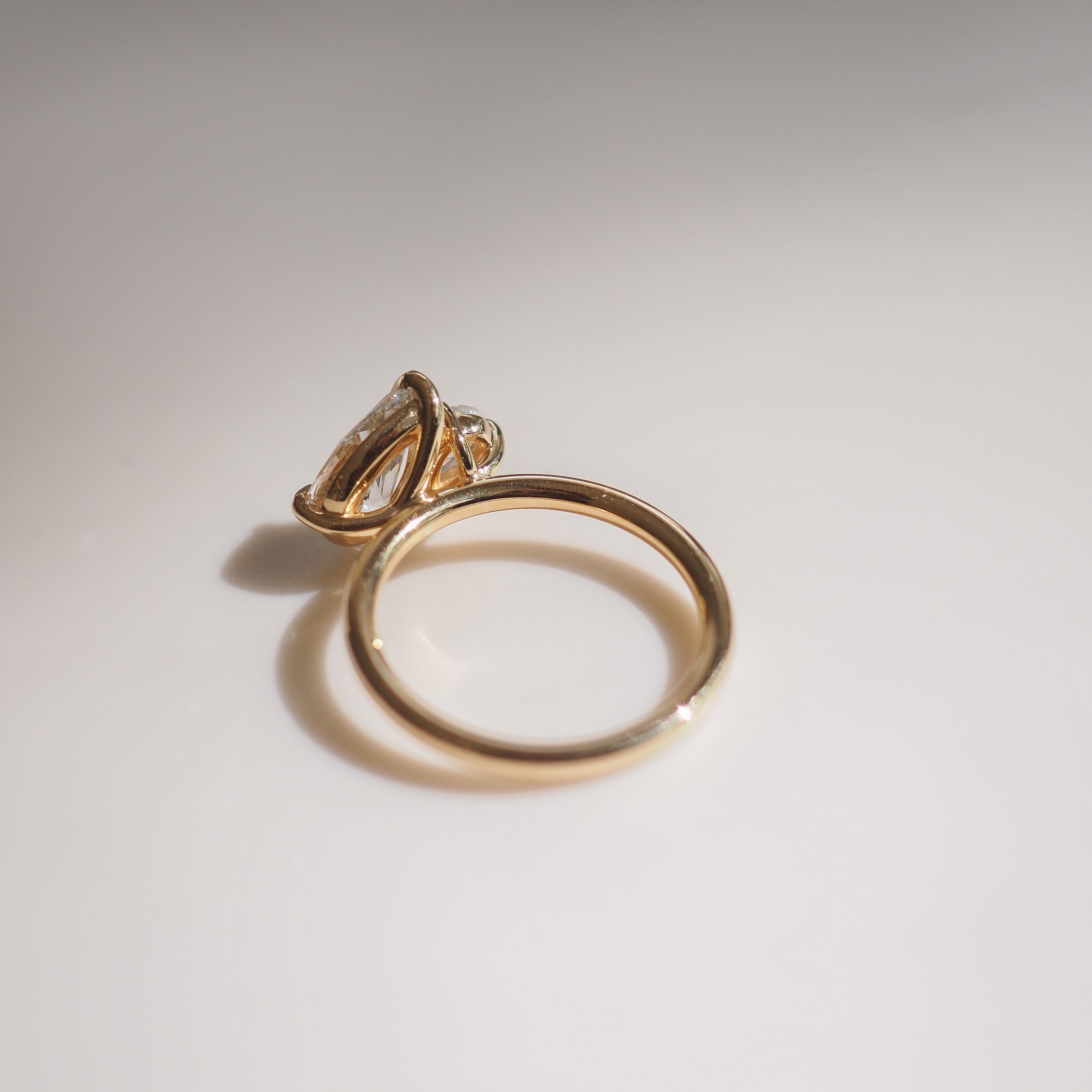 Pear cut moissanite two-stone engagement ring in platinum setting, 0.90-2.0 CT