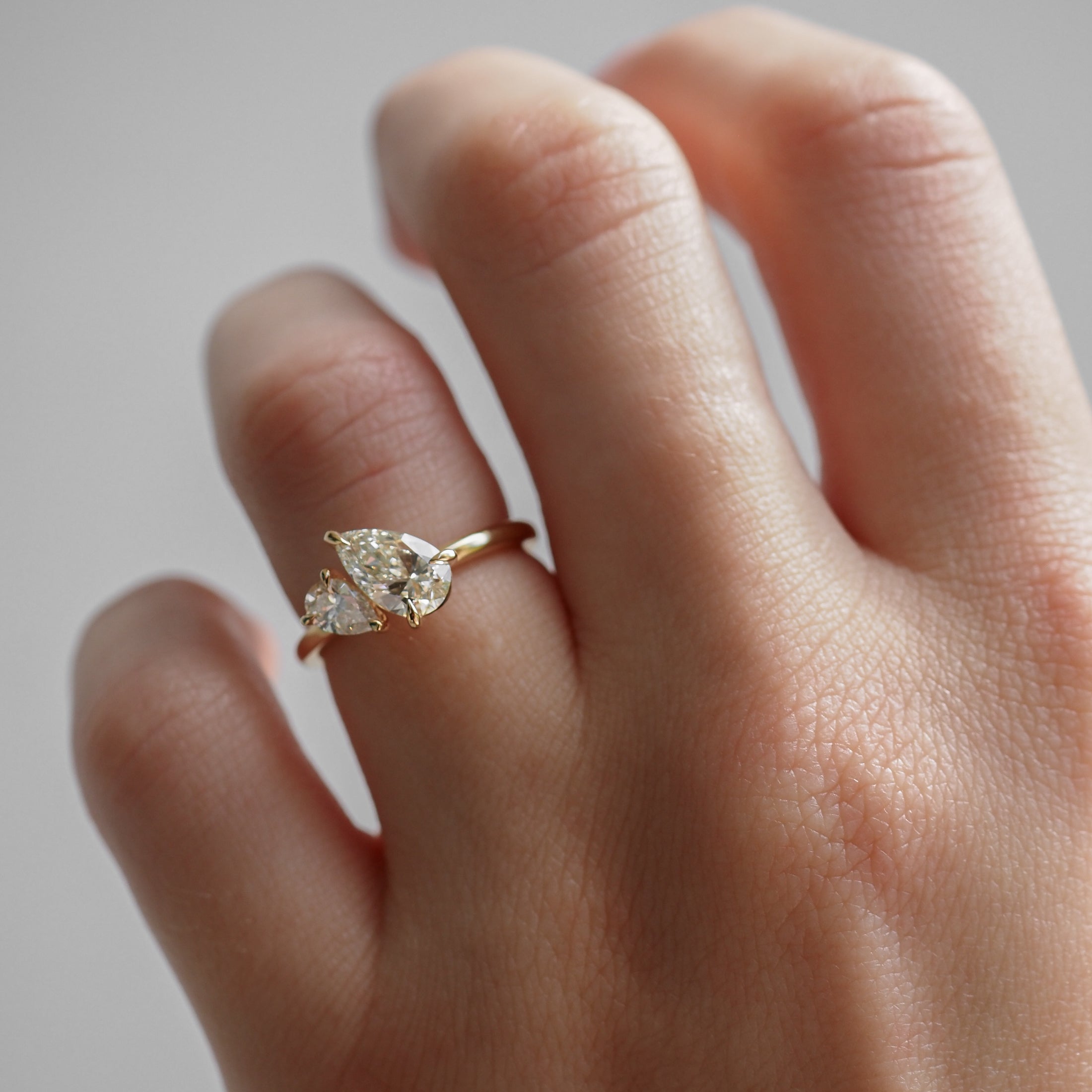 Pear cut moissanite two-stone engagement ring in platinum setting, 0.90-2.0 CT