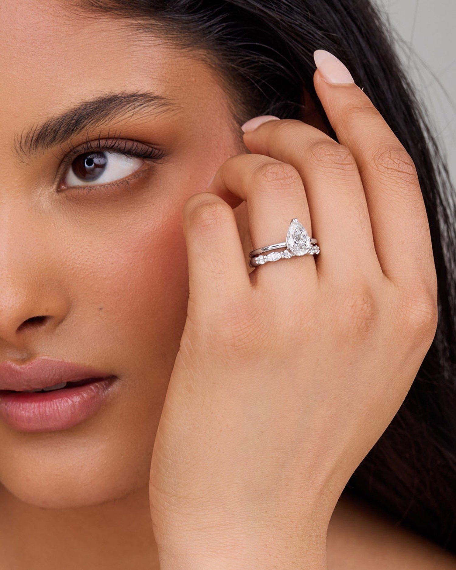 2.0–4.0 CT pear cut lab grown CVD diamond solitaire engagement ring in a classic setting for a sleek and modern bridal look