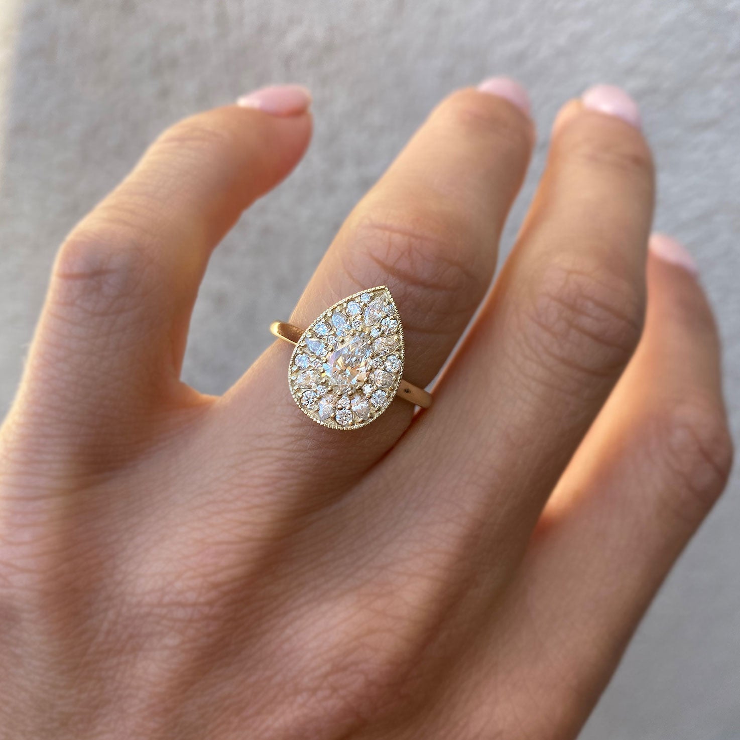 0.53 CT Pear Shape Lab Grown halo Engagement Ring