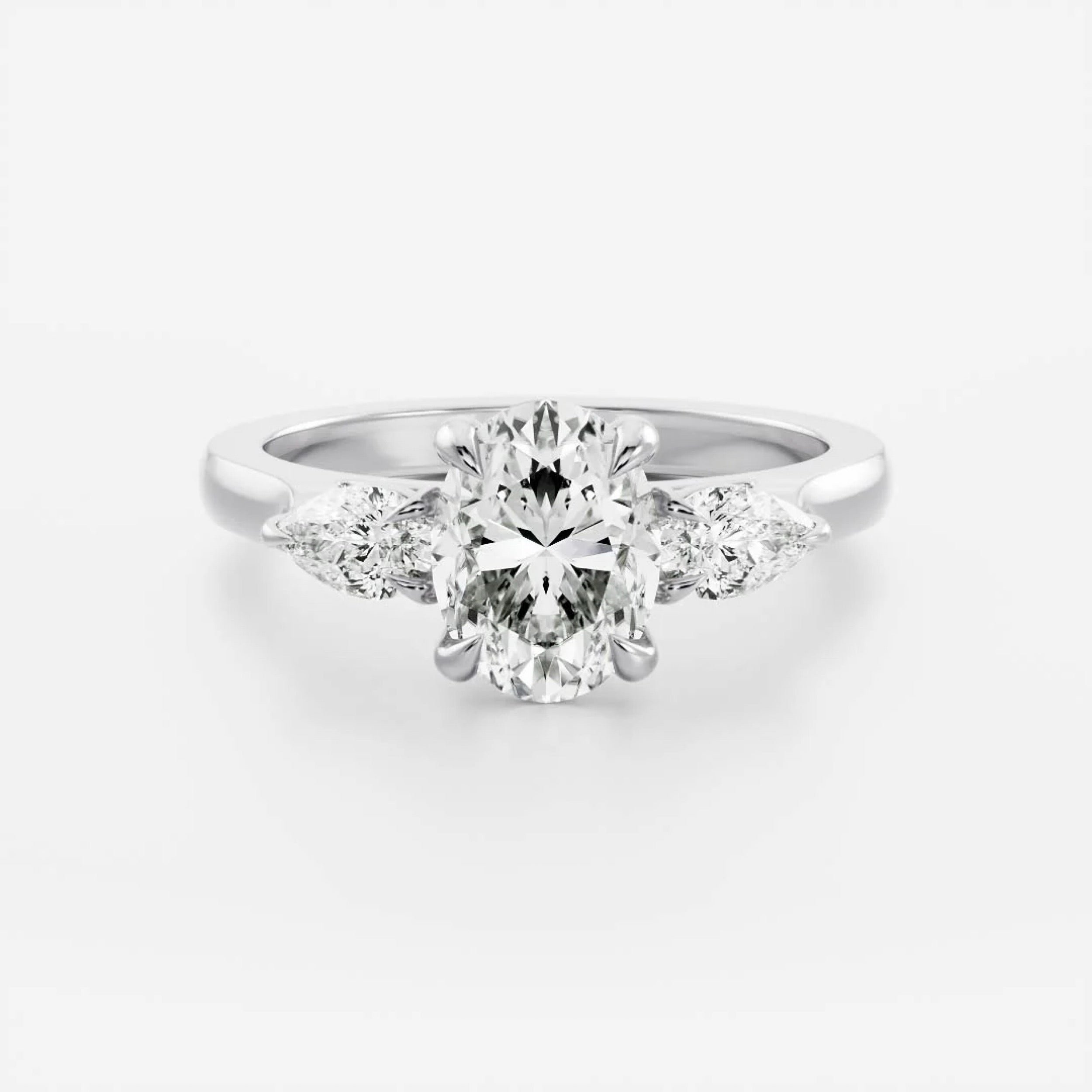 1.5 - 2.5 CT Oval Lab Grown Diamond Trilogy Engagement Ring