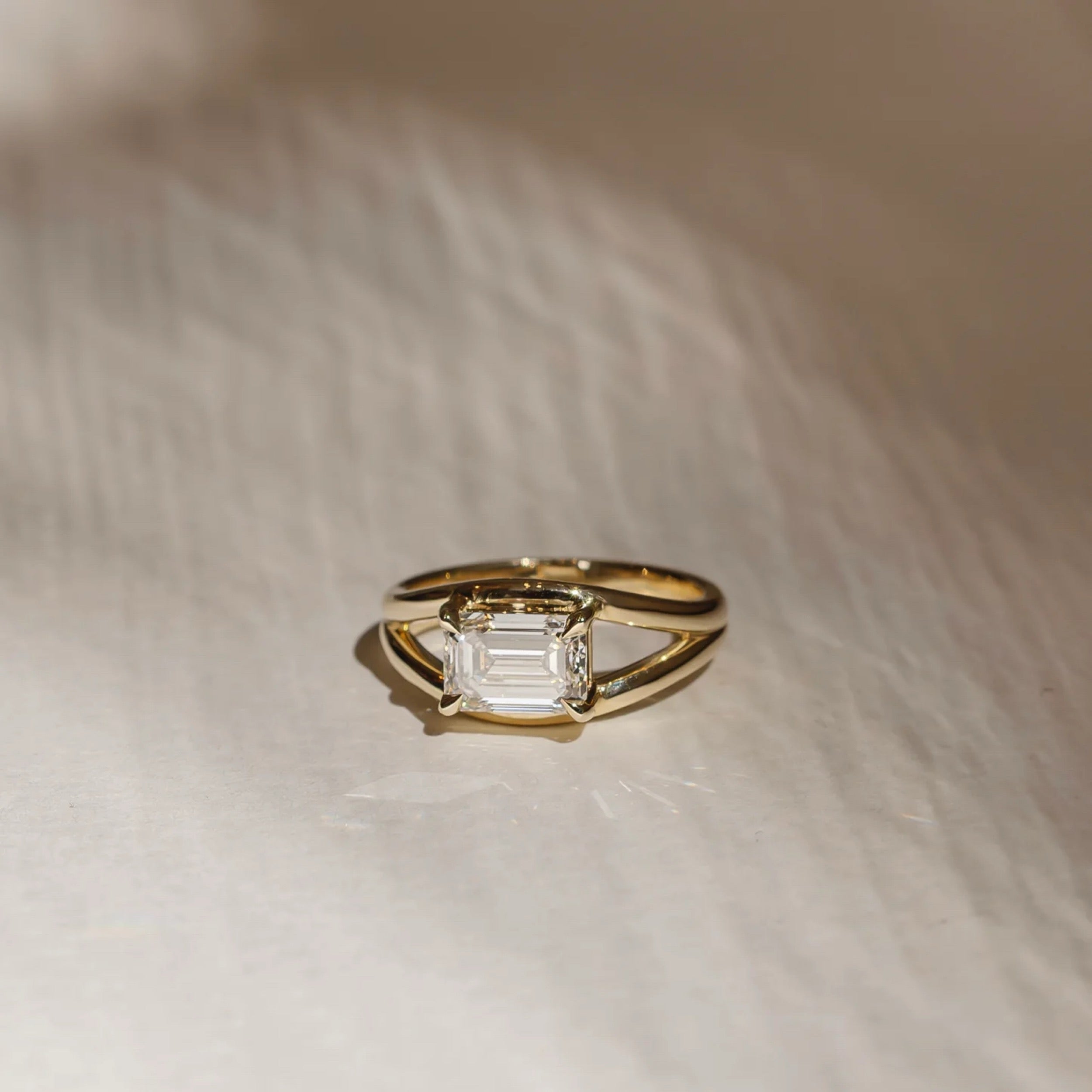 1.5 - 2.5 CT East West Emerald Lab Grown Diamond Split Shank Engagement Ring