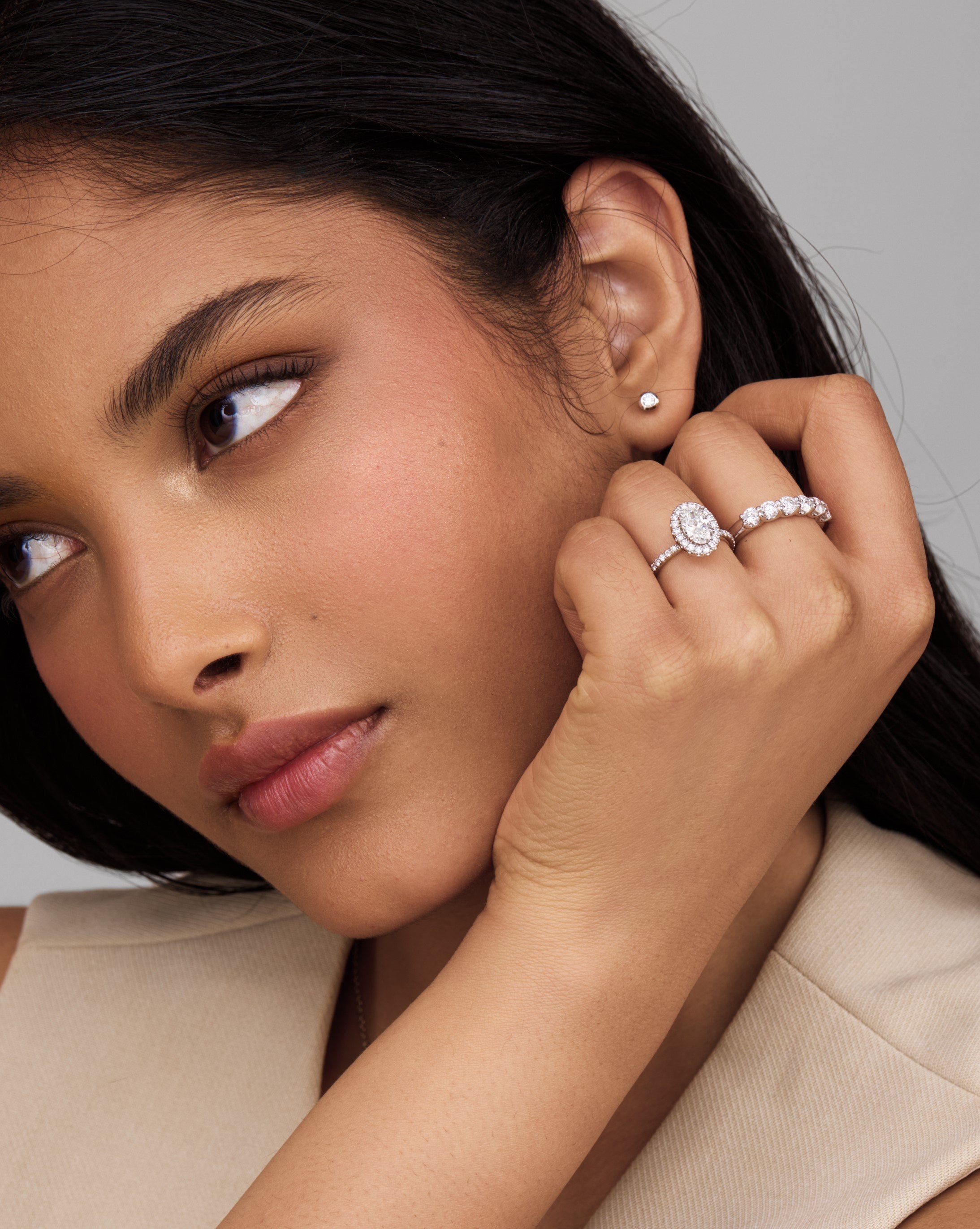 Oval cut lab grown diamond engagement ring in gold with halo and pave setting, featuring 1.5–3.5 CT center stone and shimmering accents