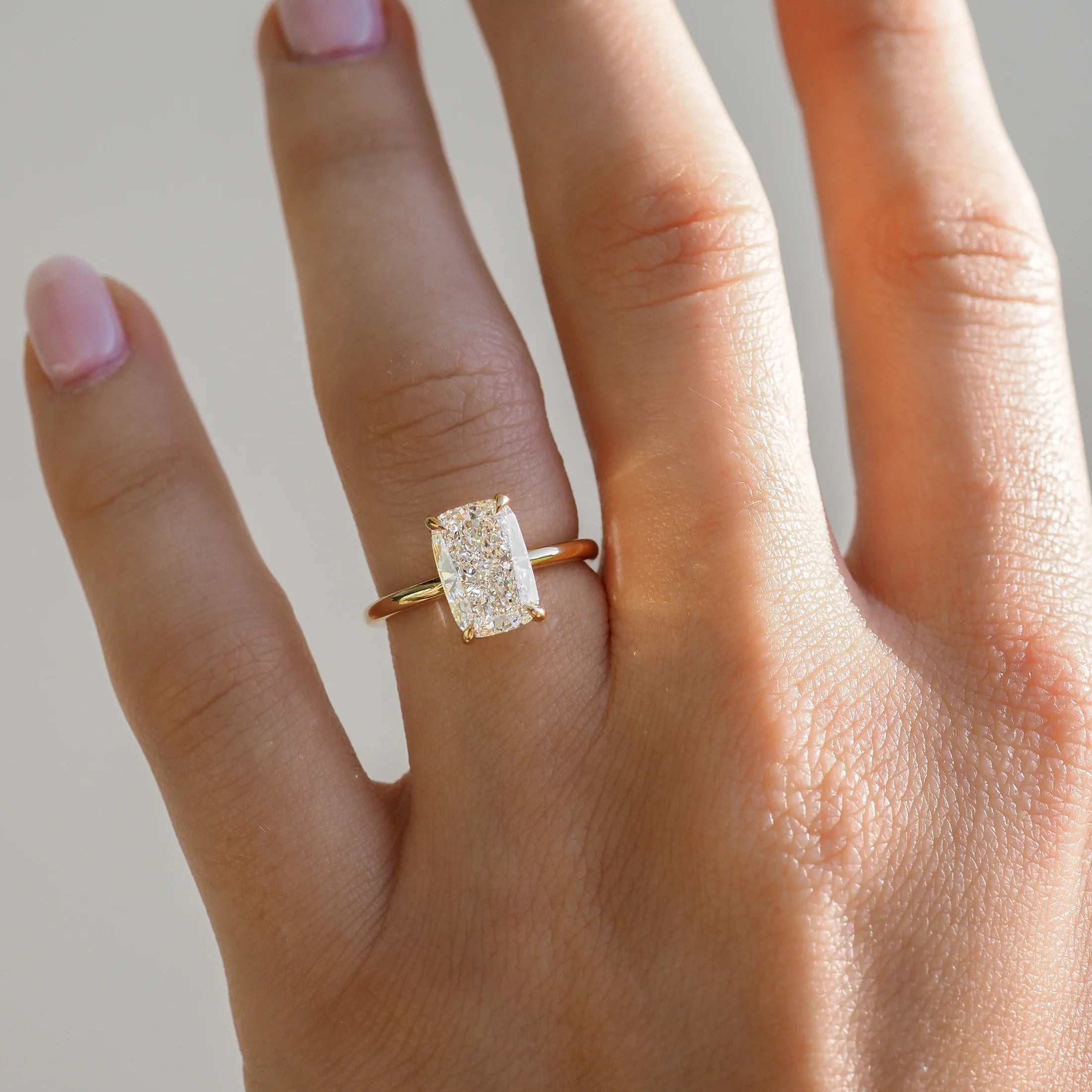 Cushion cut moissanite solitaire engagement ring in platinum setting, 1.50-2.50 CT