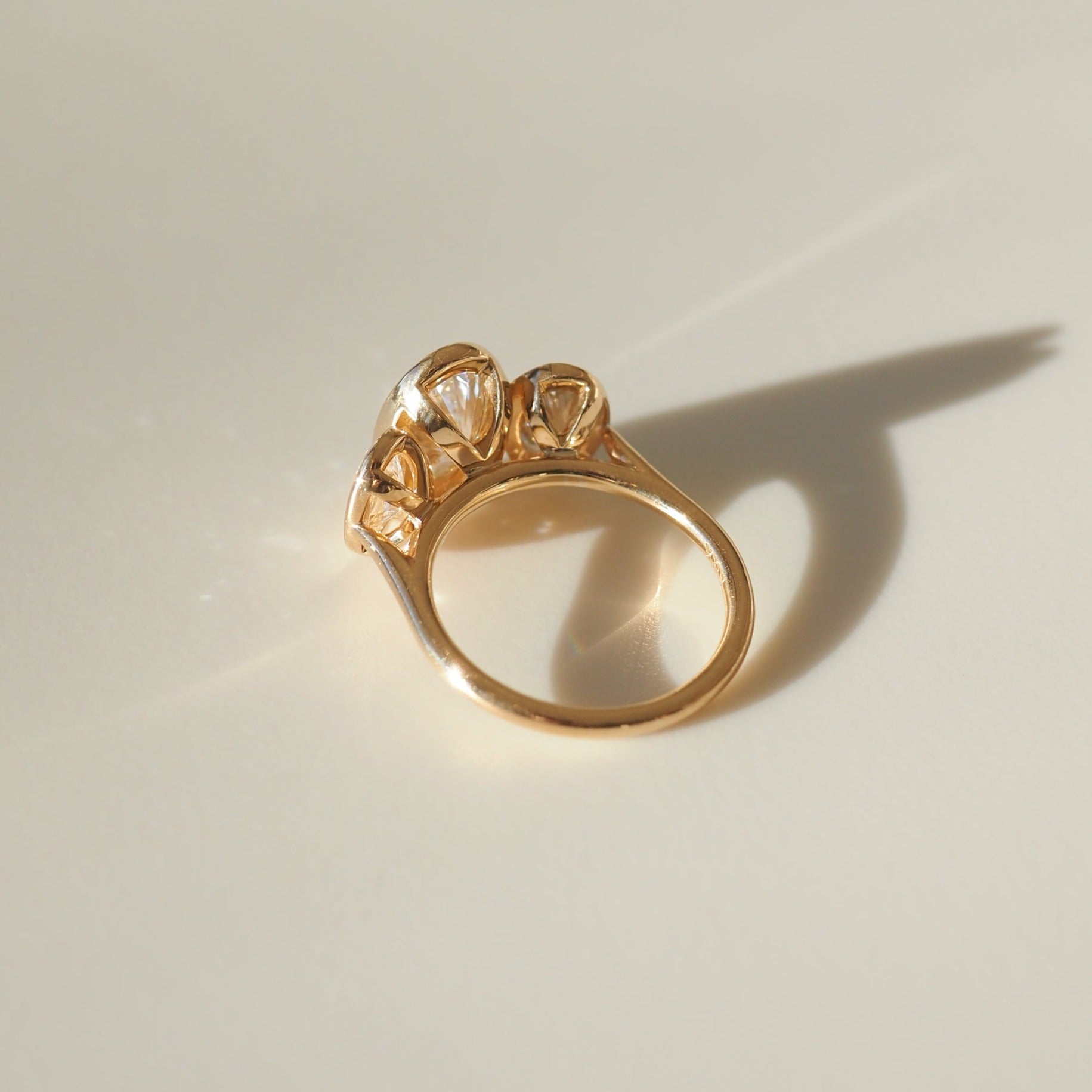 Oval cut moissanite three-stone engagement ring in white gold setting, 1.0-3.0 CT