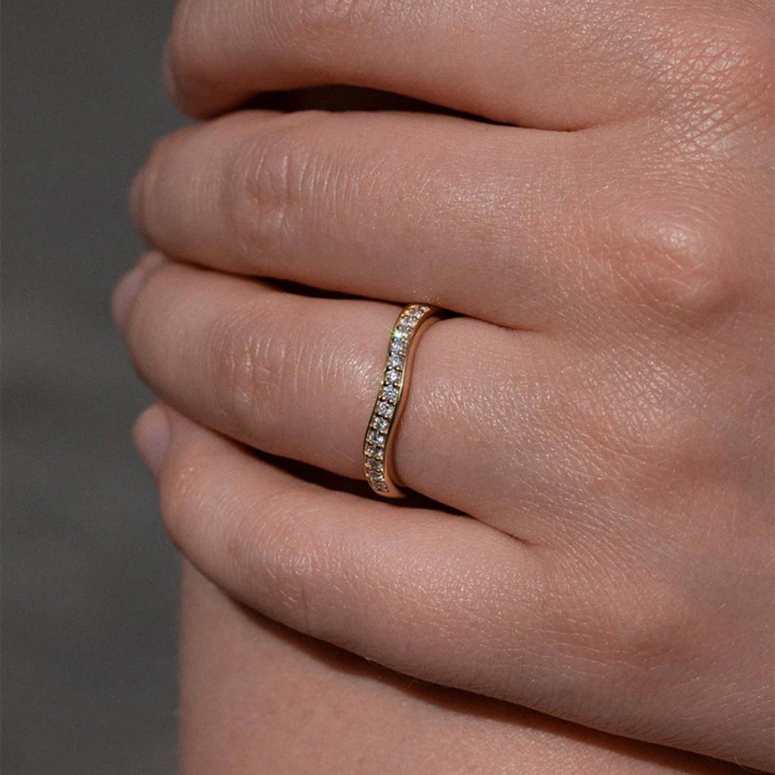 0.23 TCW Round Diamond Curved Wedding Band