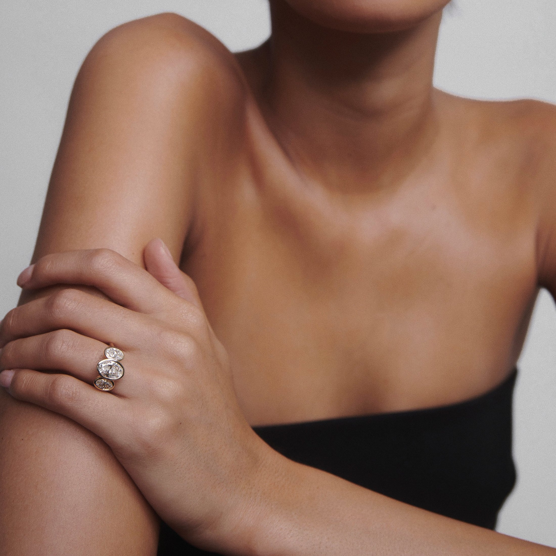 Oval cut moissanite three-stone engagement ring in white gold setting, 1.0-3.0 CT