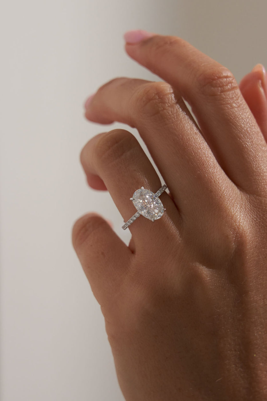 4.50 CT Oval Shaped Moissanite Hidden Halo & Pave Engagement Ring