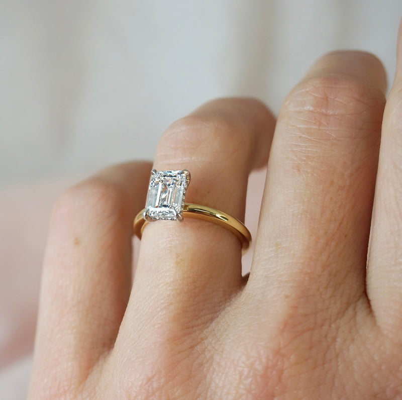 1.50 Carats Lab Grown Diamond Emerald Shape E-VS1 Hidden Halo Two Tone Engagement Ring - Camila Brown
