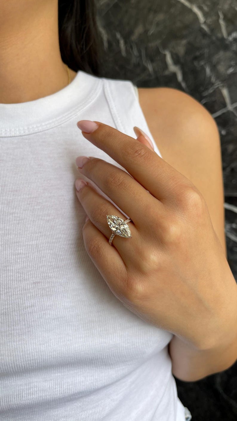 3.0 - 5.0 CT Marquise Lab Grown Diamond Hidden Halo & Pave Engagement Ring