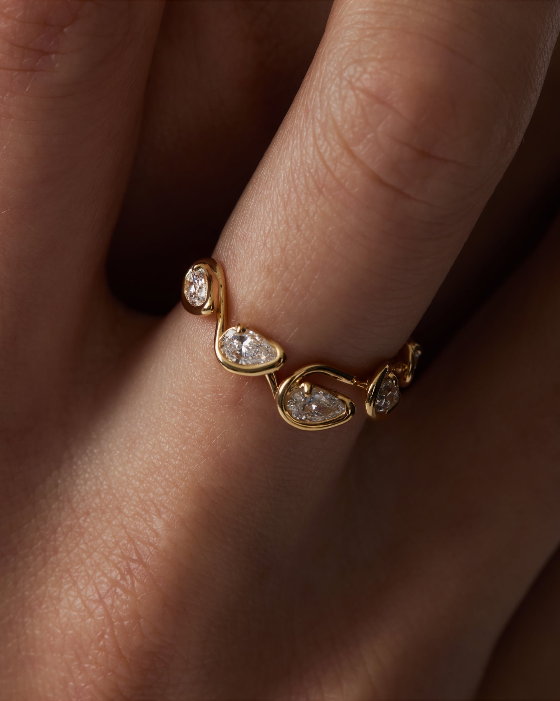0.10 TCW Pear EF-VVS Diamond bezel Wedding Band